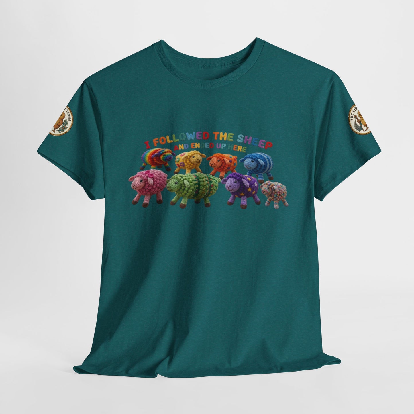 Teal crew-neck T-shirt with colorful sheep lineup and red slogan text
