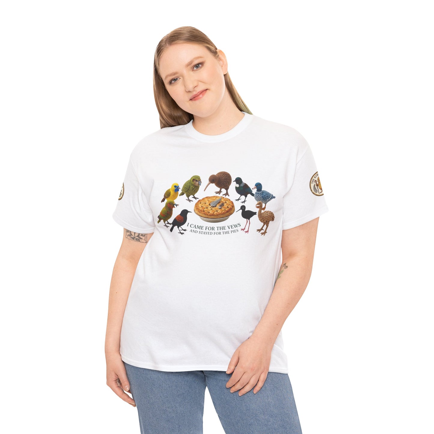 White short-sleeve T-shirt on model, front shows colorful birds and pie graphic.