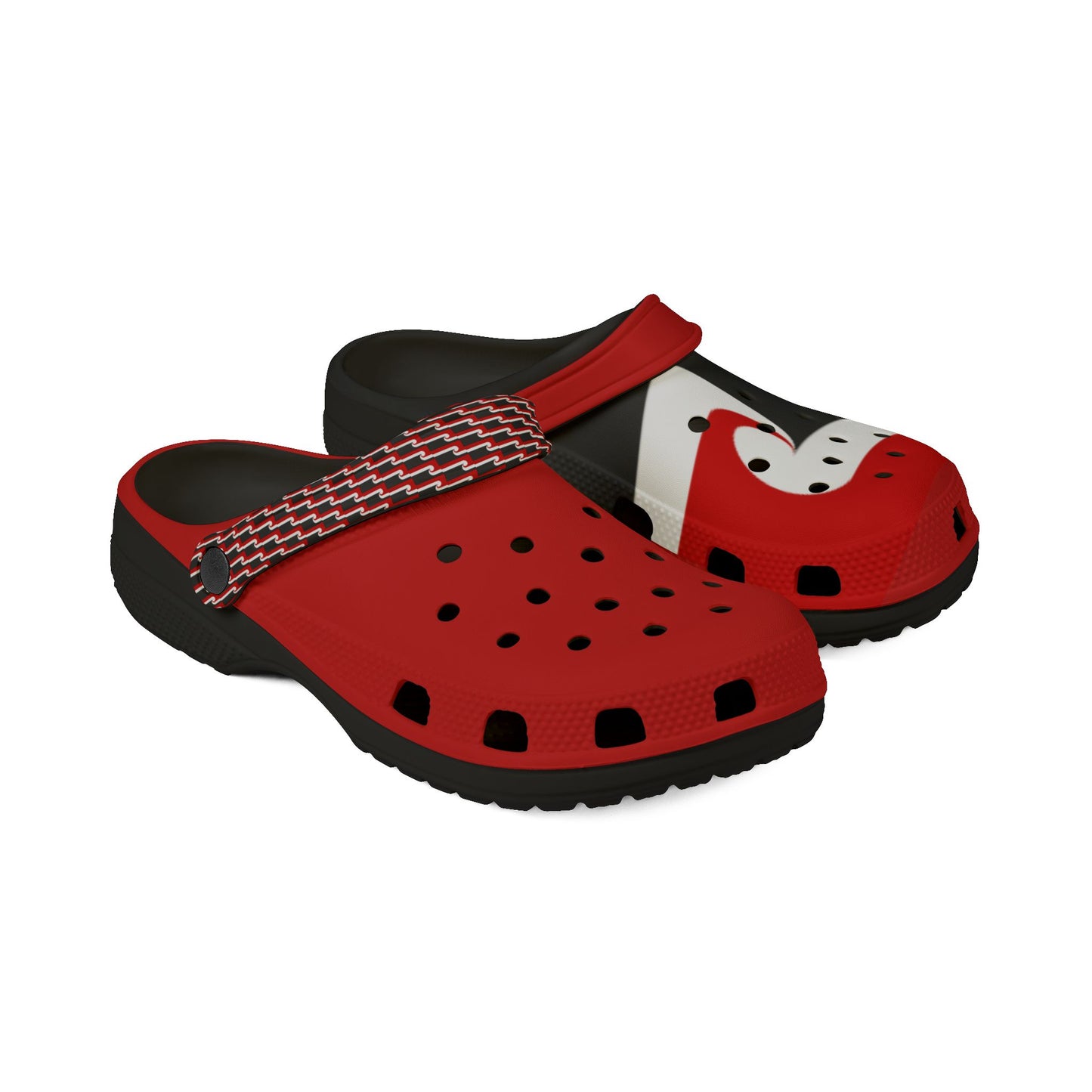 Red and black slip-on clogs with perforated top and striped strap detail