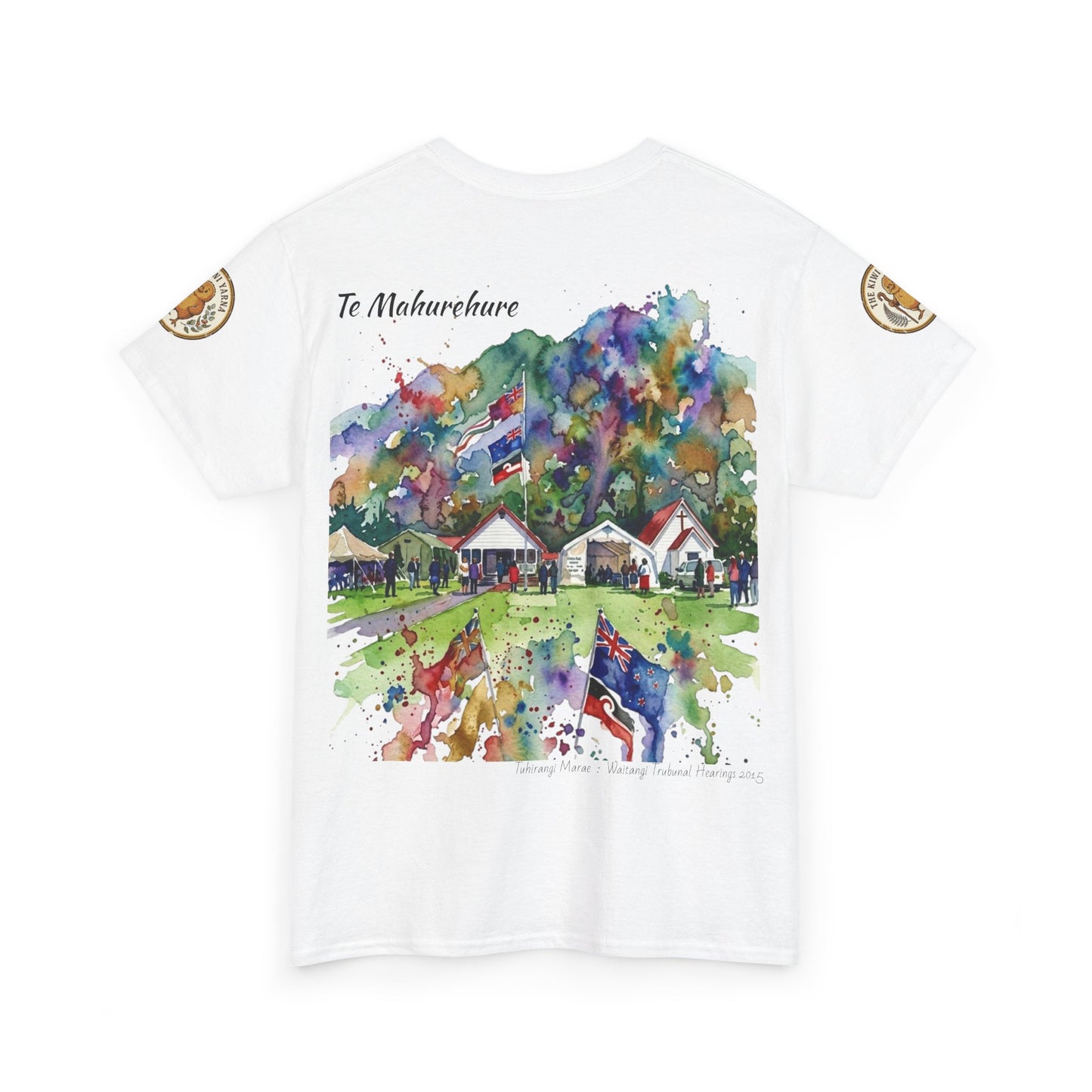 White graphic T-shirt with colorful watercolor village print and circular sleeve patches