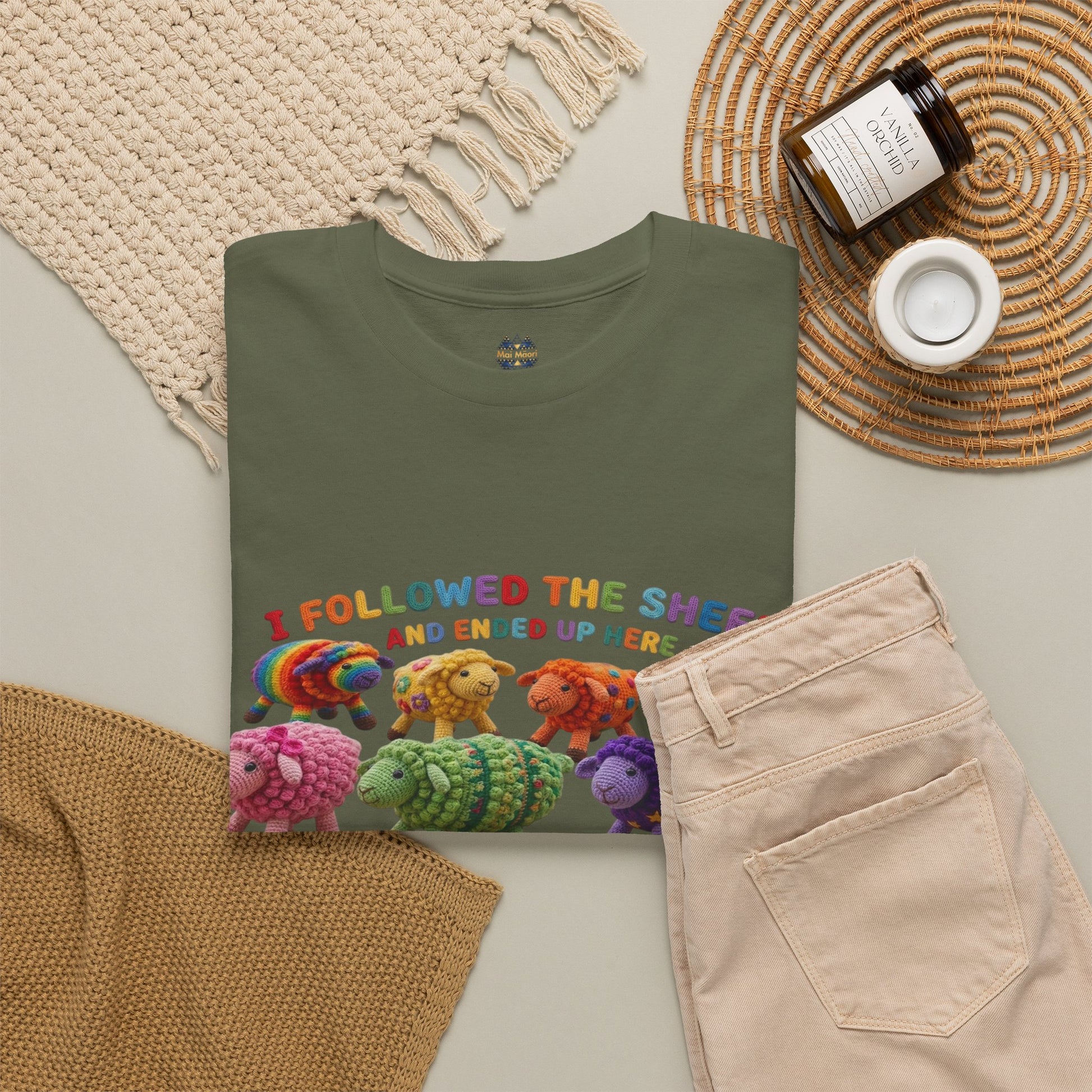 Olive green graphic T-shirt with sheep print and small logo at crew neckline
