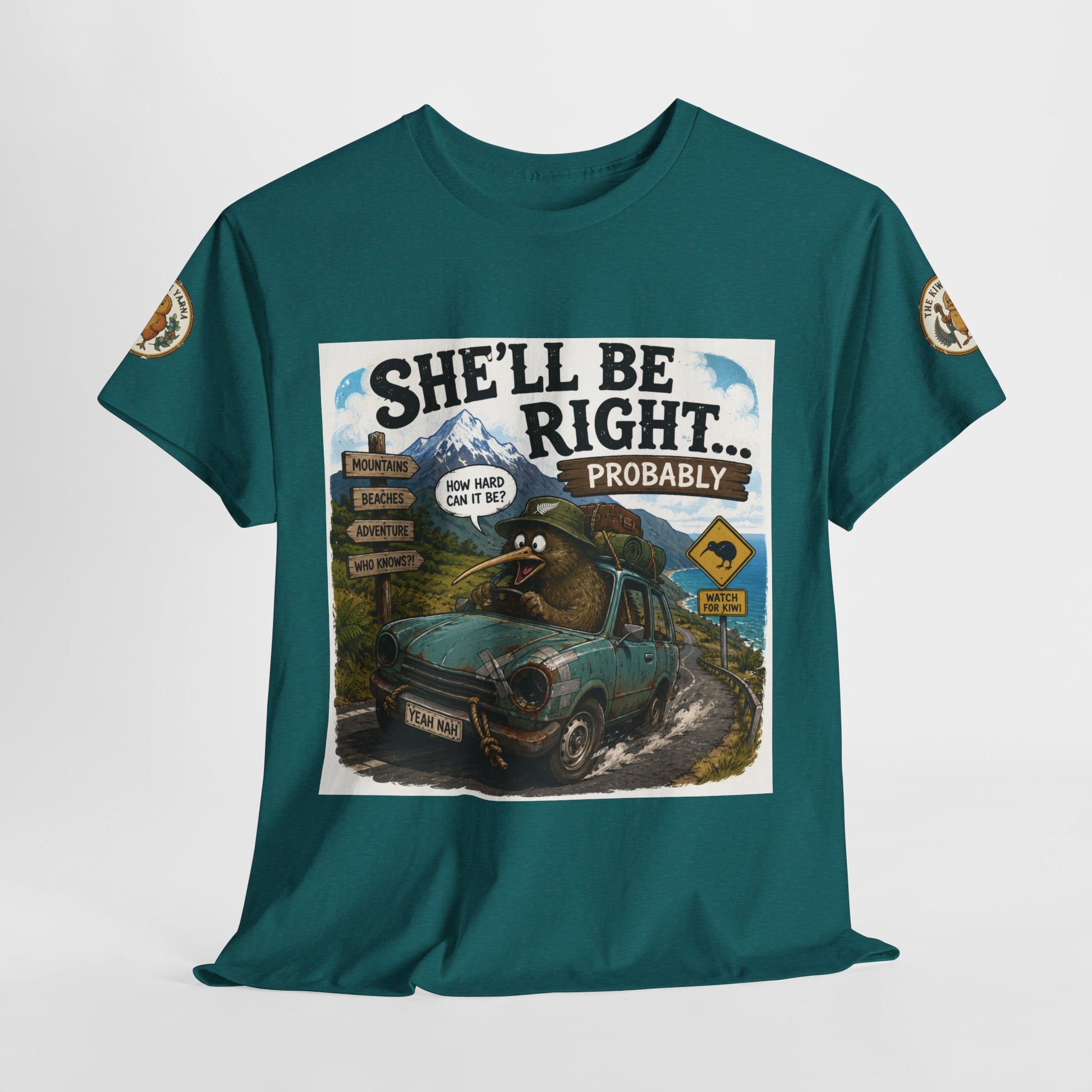 Teal graphic T-shirt with 'She'll Be Right... Probably' front panel and sleeve emblems