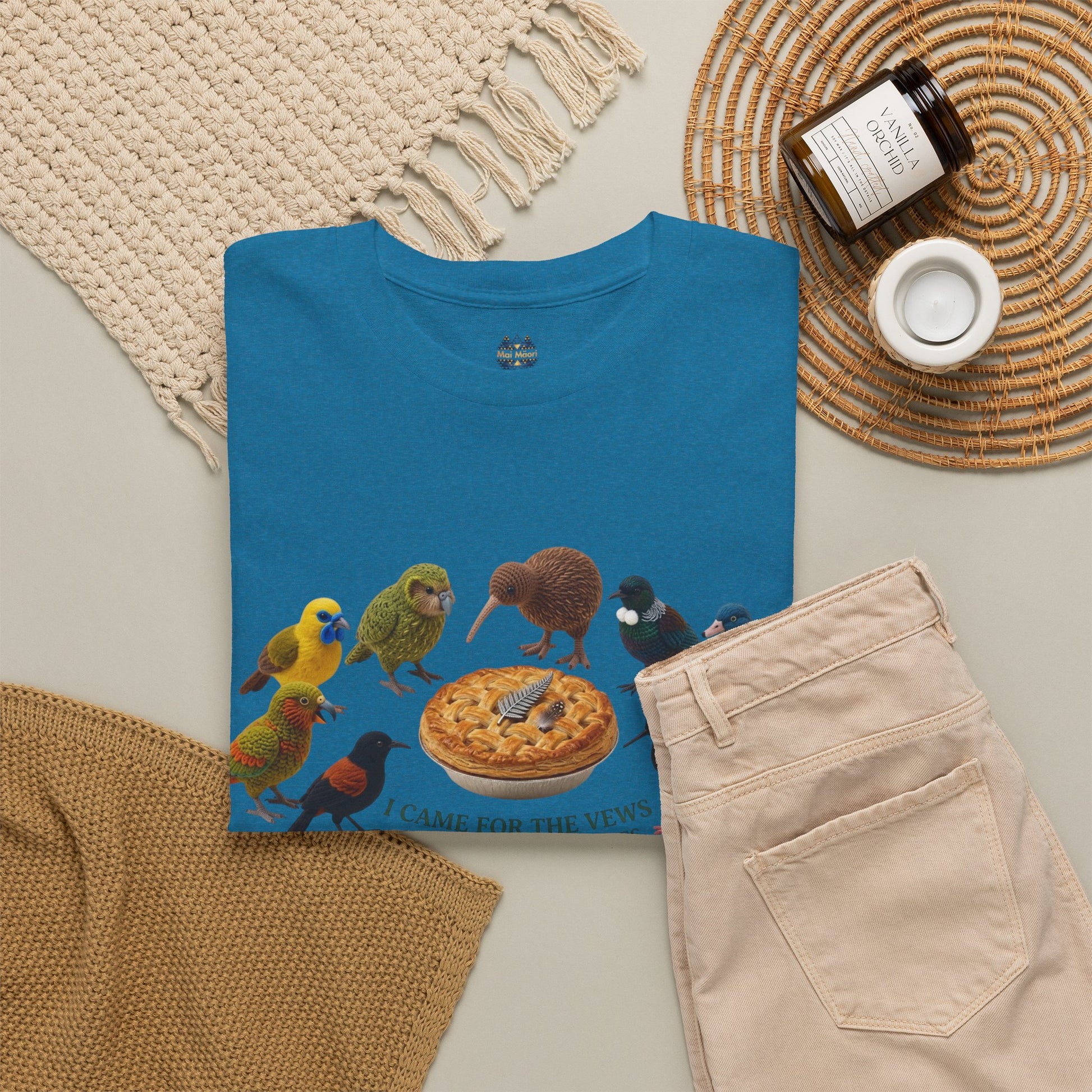 Blue graphic T-shirt with bird-and-pizza artwork, crew neck detail