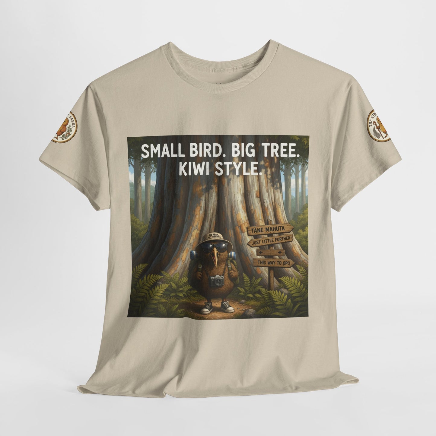 Beige short-sleeve T-shirt with centered forest scene graphic and 'Kiwi Style' text