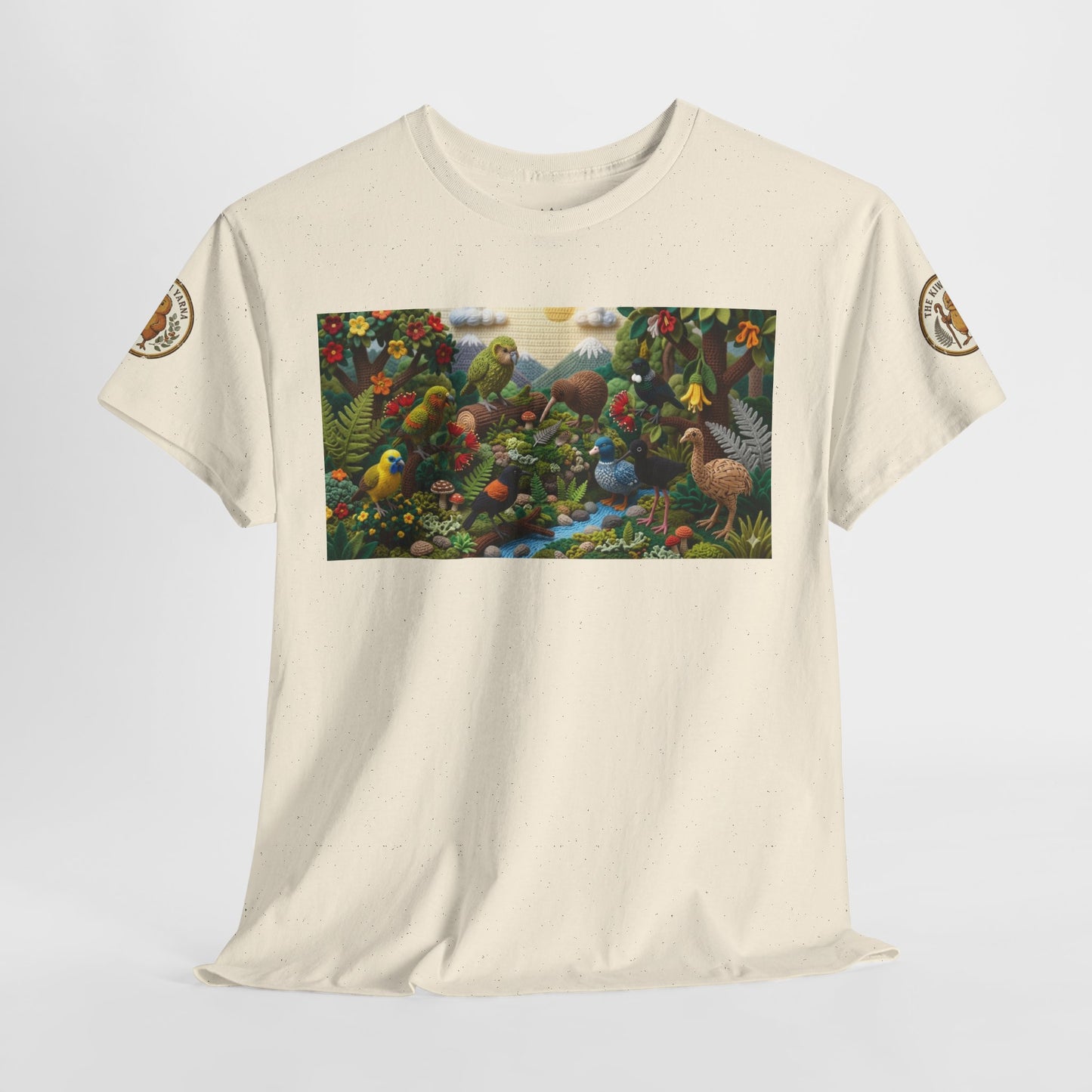 Oatmeal crewneck T-shirt with colorful bird-and-forest rectangular graphic and sleeve patches