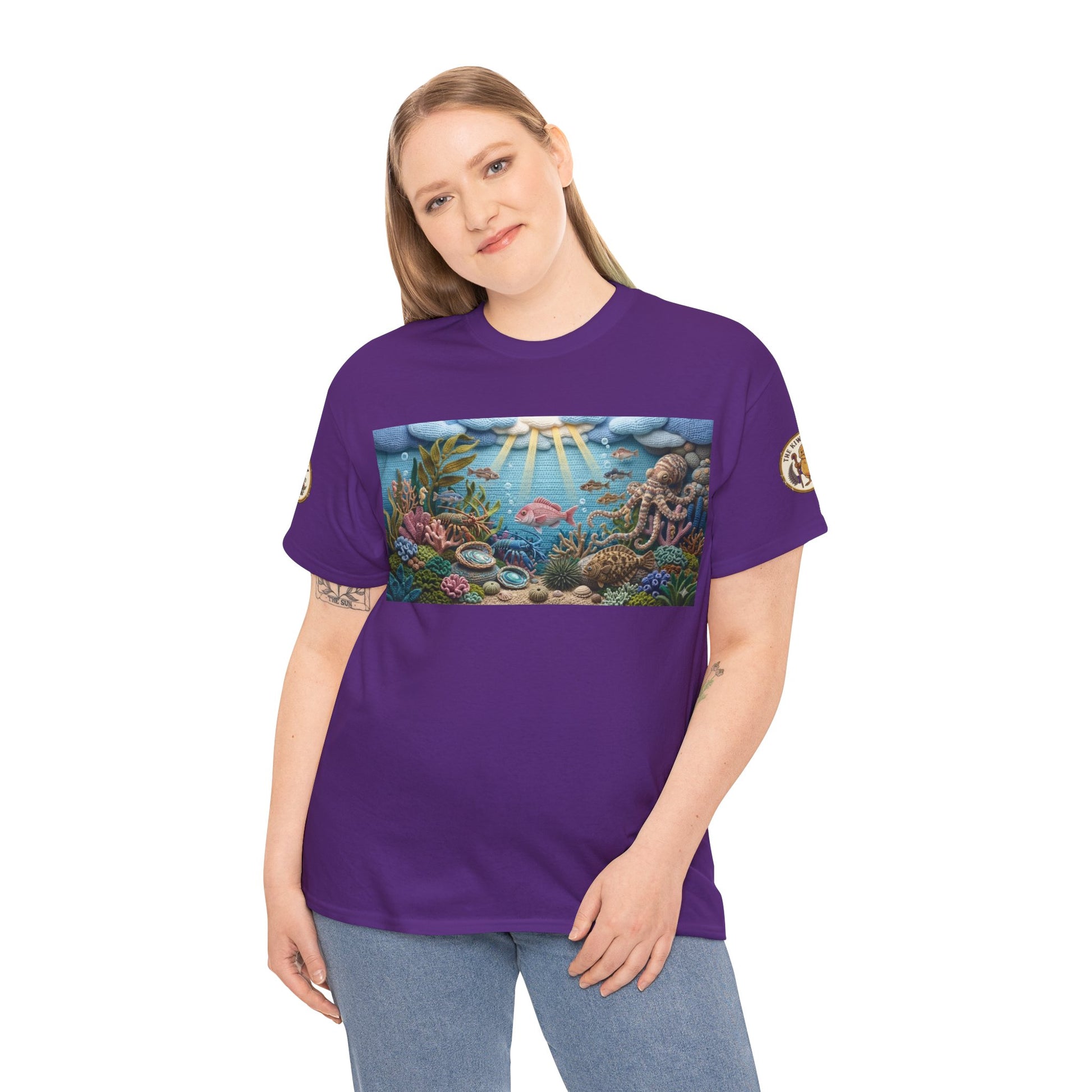 Crewneck T-shirt on model: purple with ocean scene chest graphic