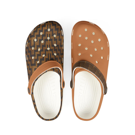 Slip-on clog with dark patterned upper, tan trim, and white vented outsole