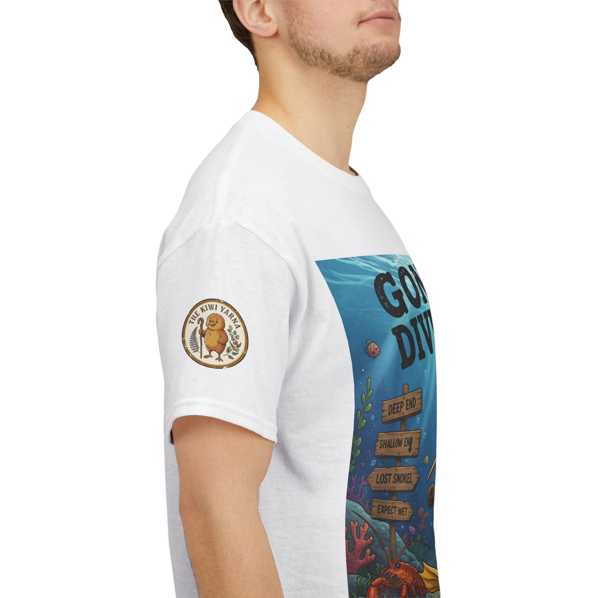 White crewneck t-shirt side view with circular sleeve patch and diving graphic