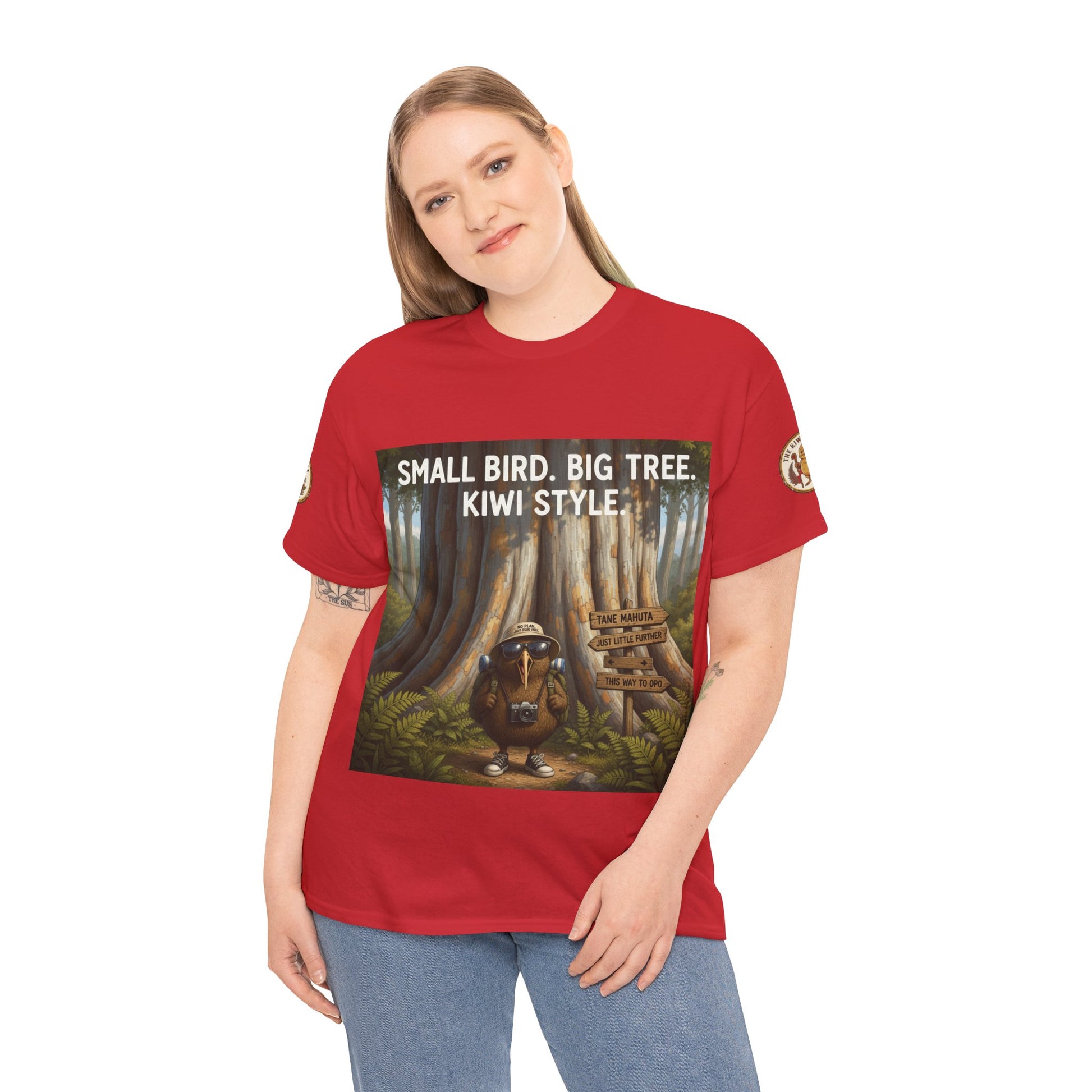 Red short-sleeve crew T-shirt on model, front graphic with 'Small Bird, Big Tree.'