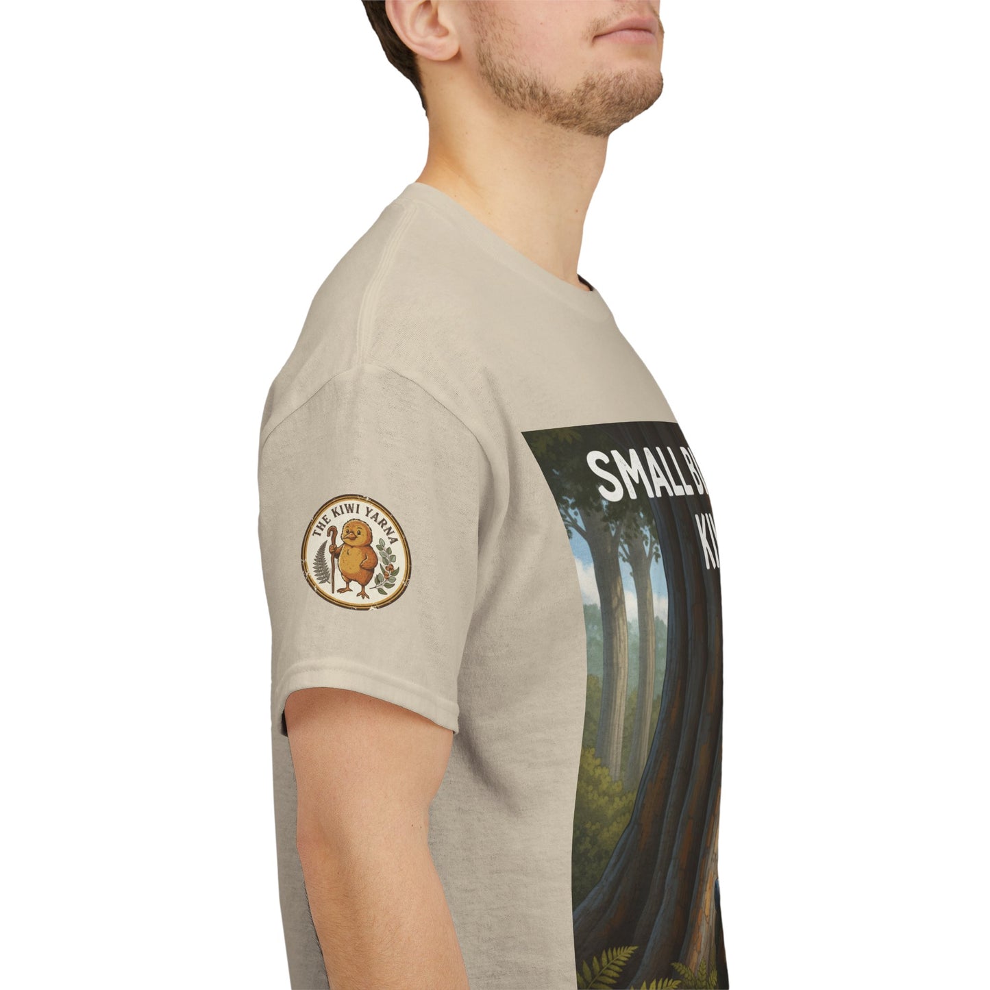 Beige T-shirt with circular sleeve patch and part of forest graphic
