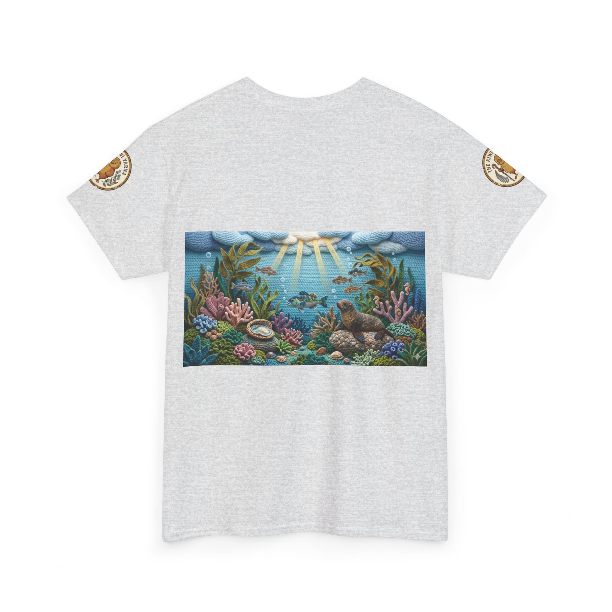 Light gray crewneck T-shirt with rectangular ocean scene print and small sleeve logo patches