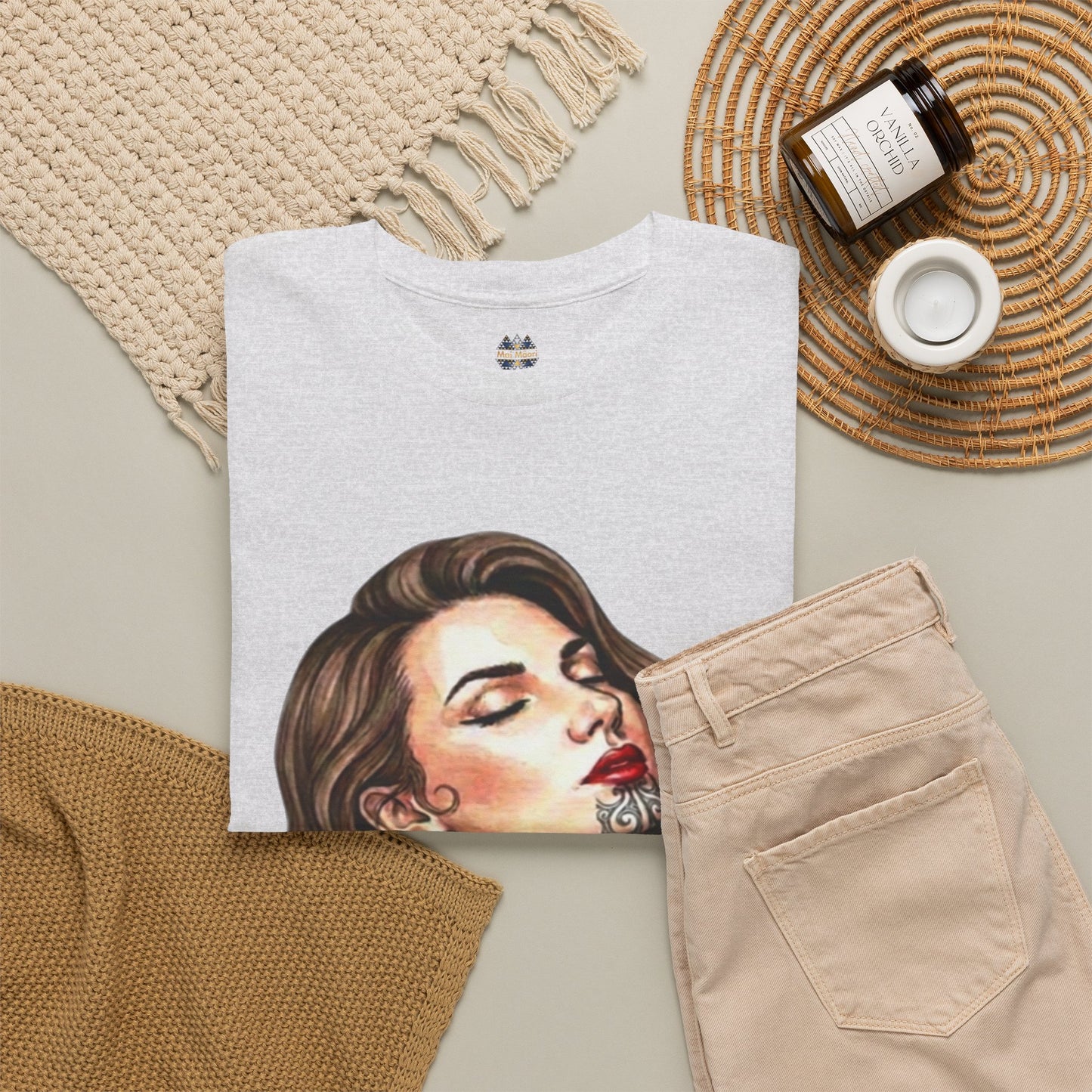 Korowai graphic t-shirt, white; partial portrait print; small chest logo