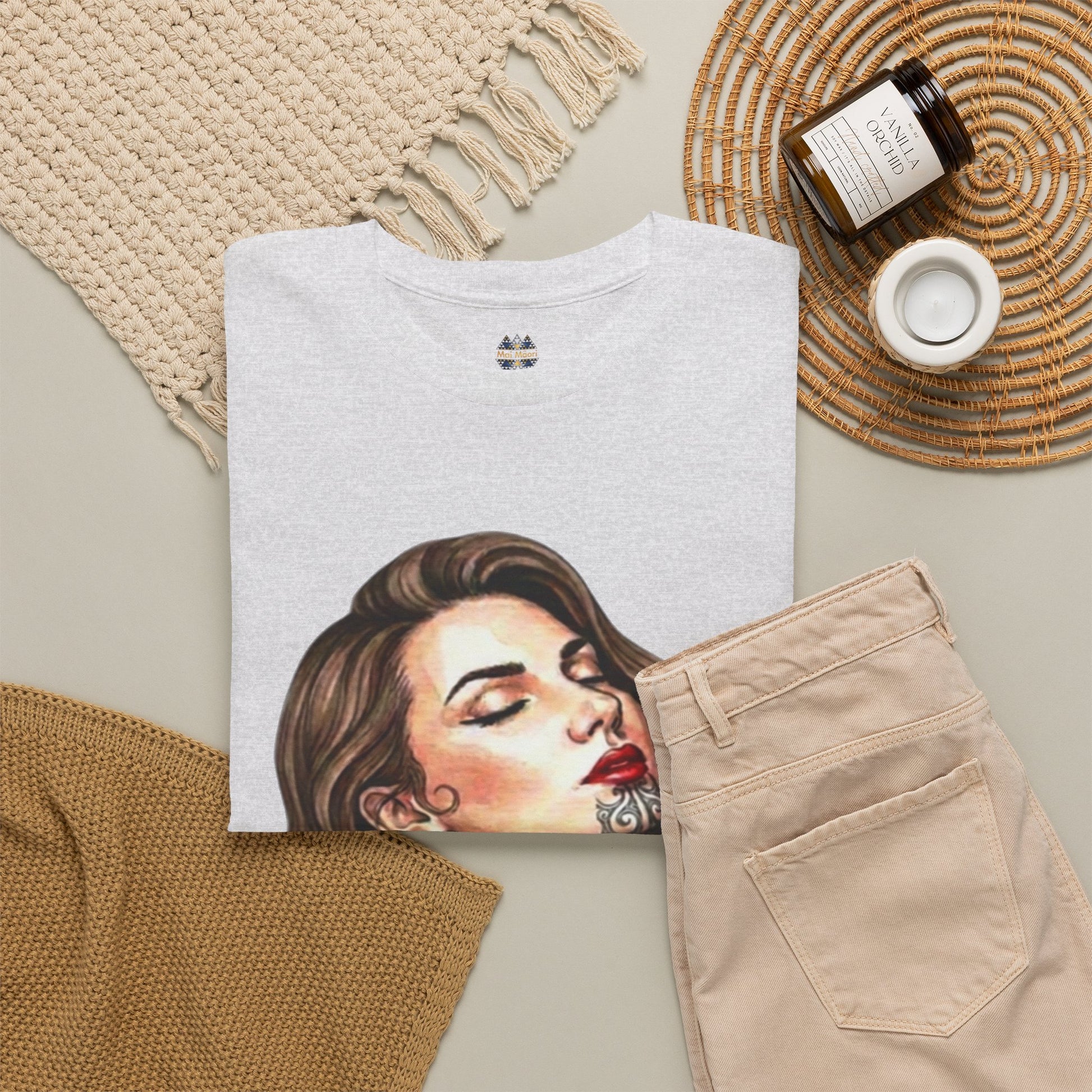 Korowai graphic t-shirt, white; partial portrait print; small chest logo