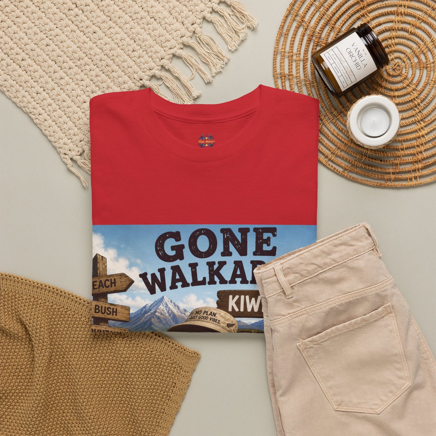 Red crew-neck short-sleeve T-shirt with front graphic print and small chest logo.