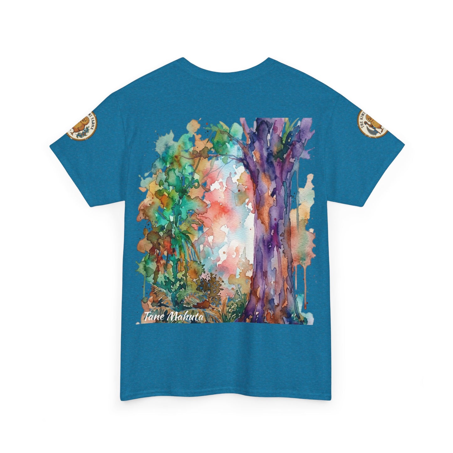 Blue graphic T-shirt with colorful tree artwork and small badge on left sleeve