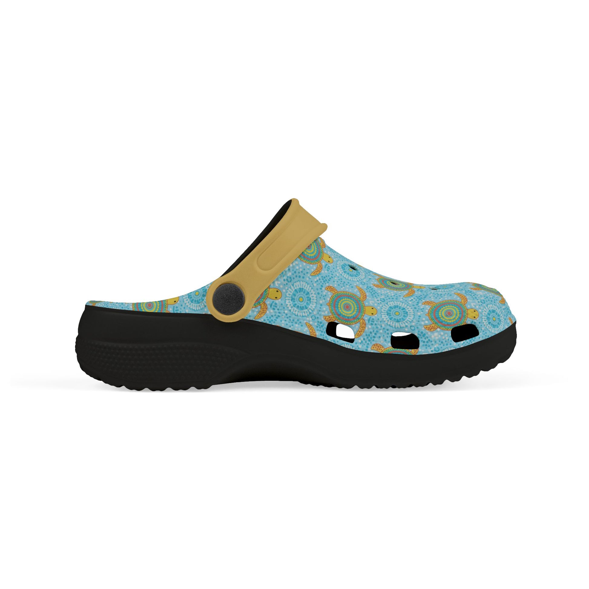 Side view blue patterned slip-on clogs with tan strap, perforations, and black sole