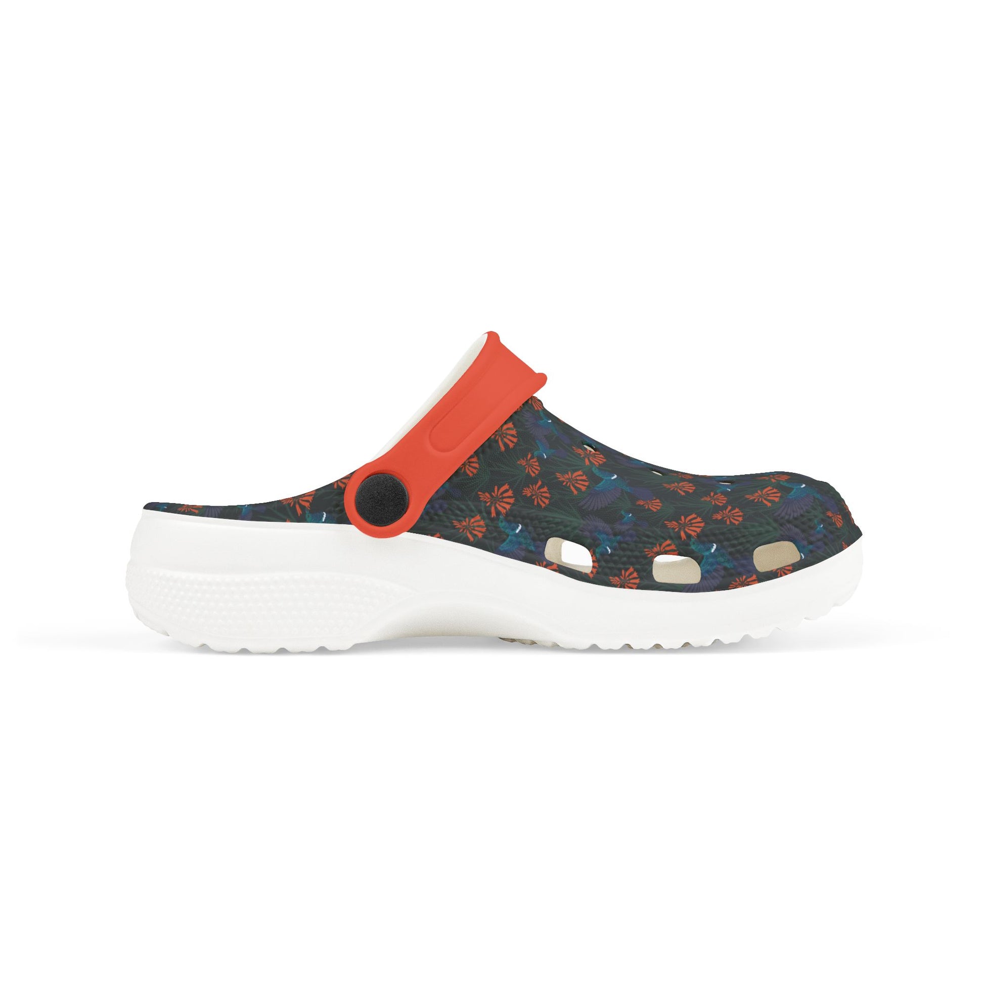 Kids clog shoe side view: orange upper with dark floral heel panel and round strap