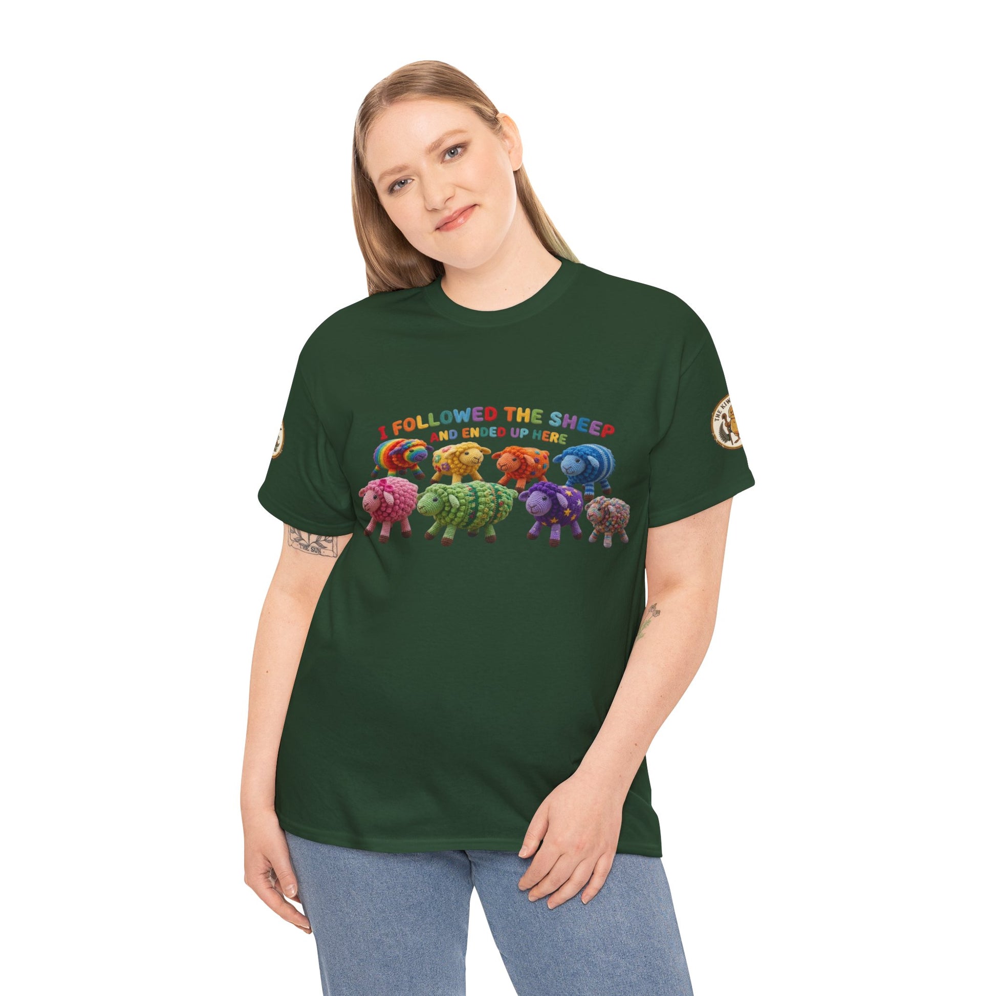 Forest green T-shirt worn by a model with colorful sheep graphic on the chest