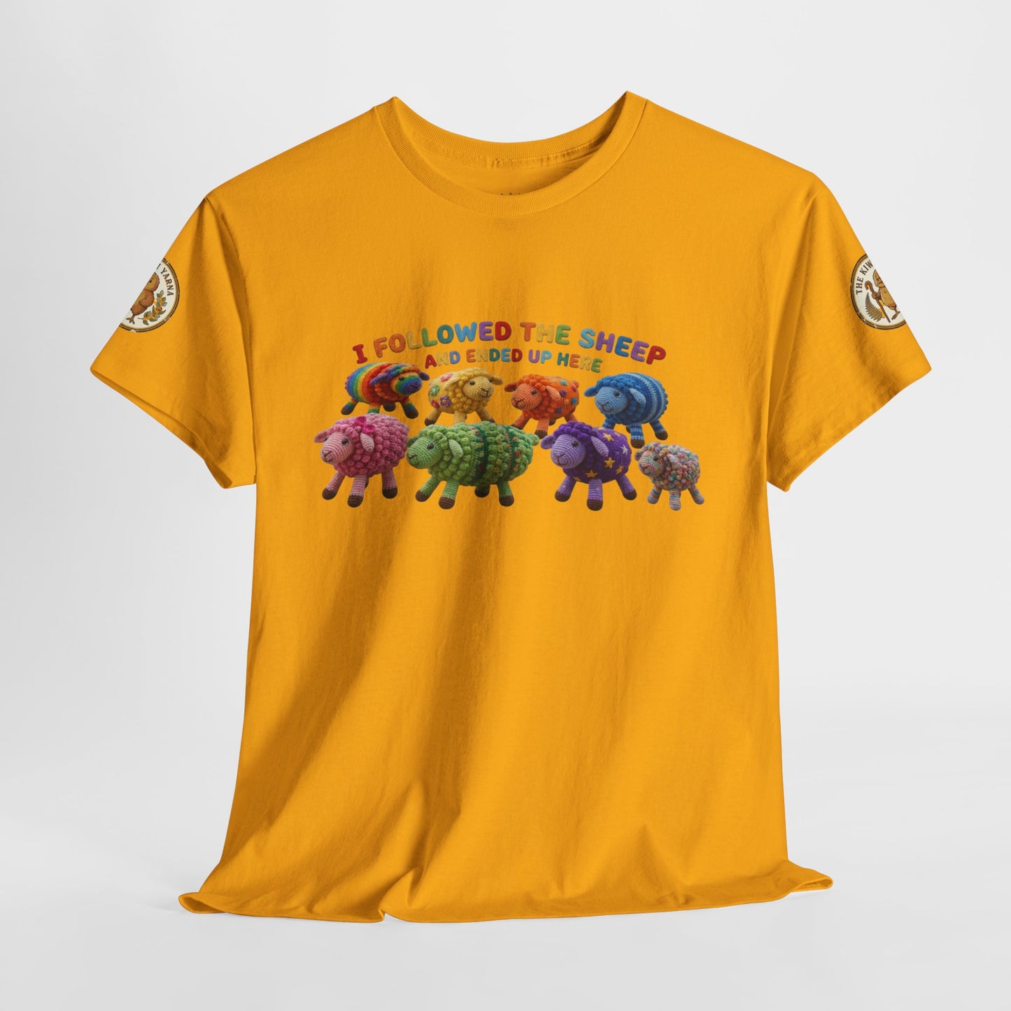 Mustard yellow front view T-shirt with colorful sheep herd graphic and “I followed…” text.