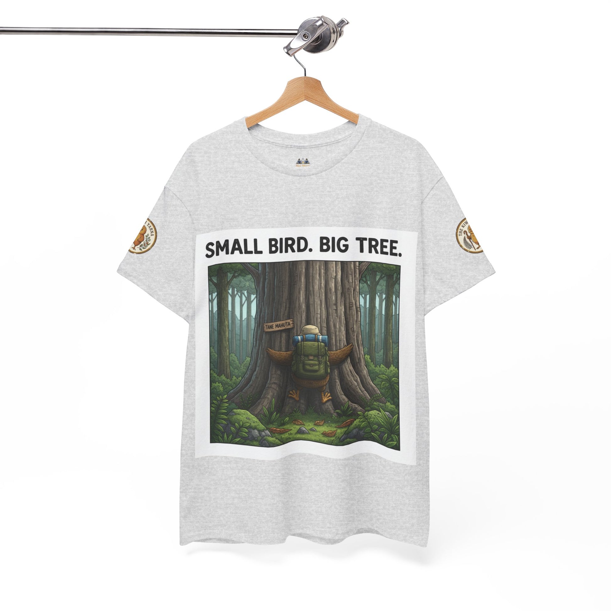 Heather gray T-shirt on hanger with forest graphic and 'Small Bird. Big Tree.' print