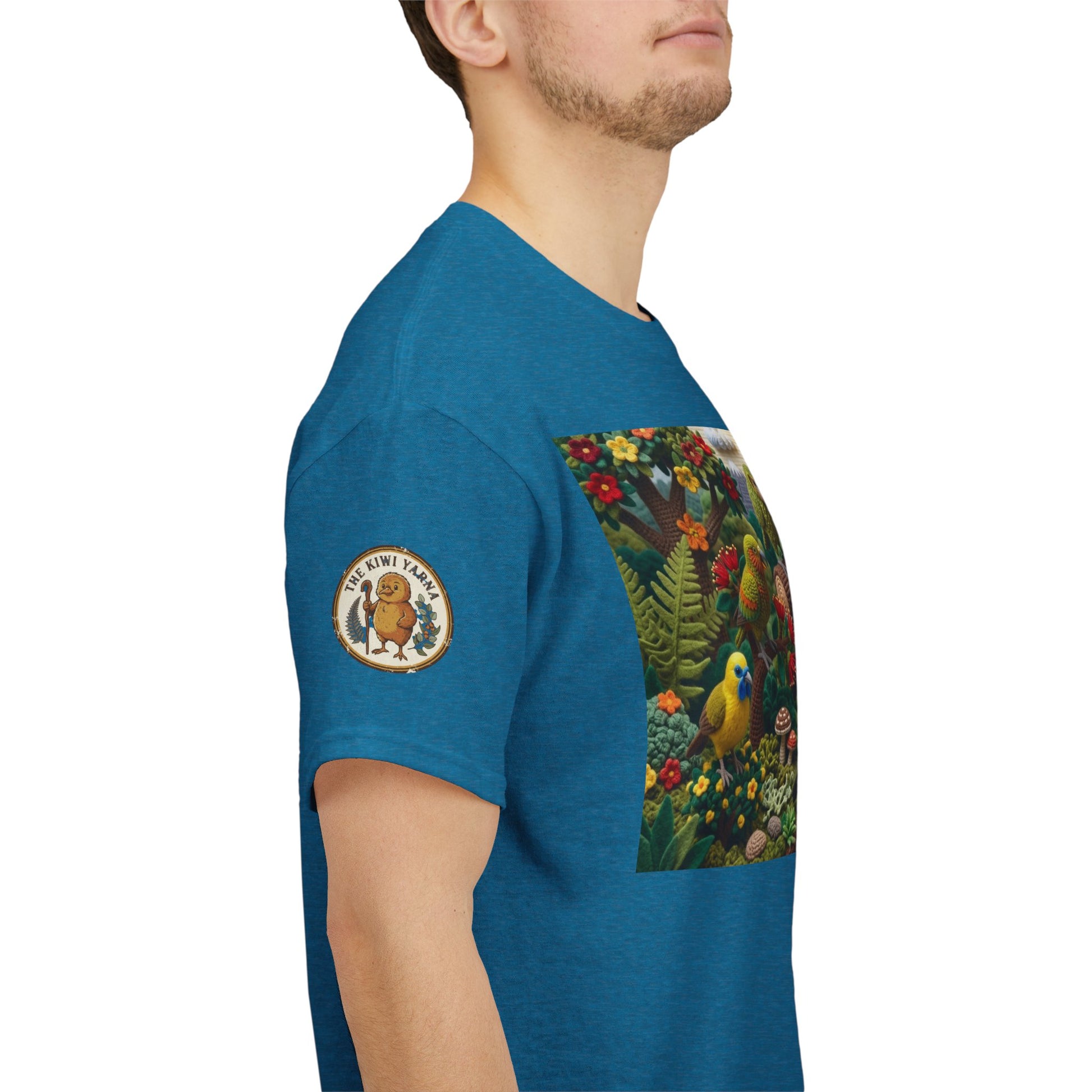 Teal crew-neck T-shirt with left sleeve patch and front rectangular bird scene panel