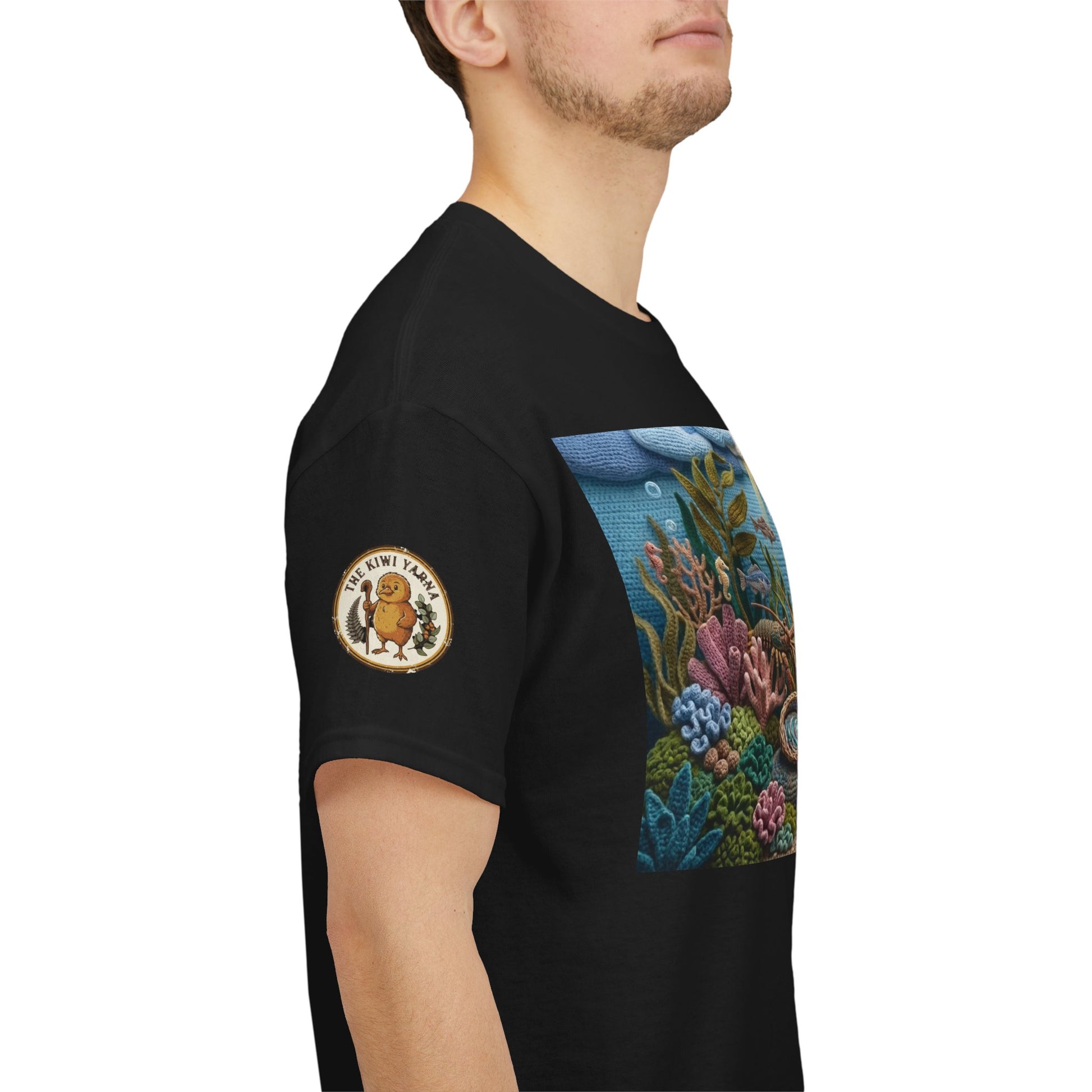 Black crew-neck T-shirt with undersea graphic panel and small sleeve patch.