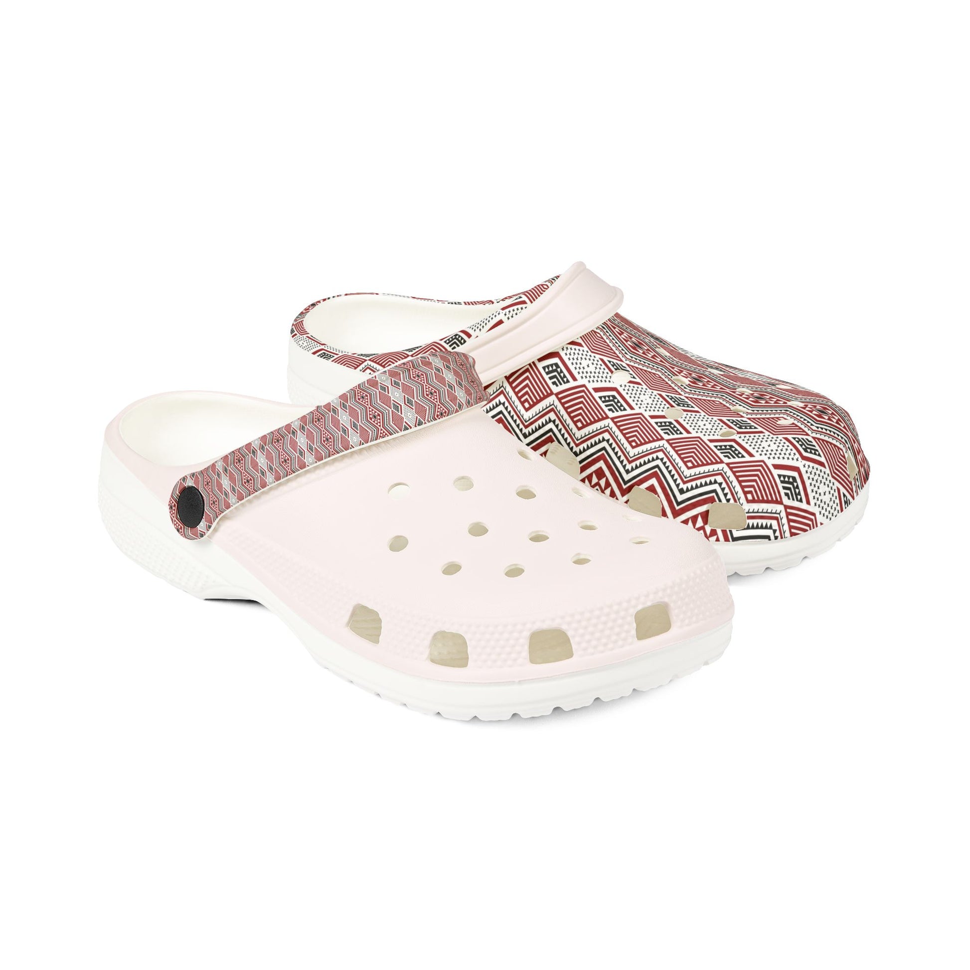 Tāniko slip-on clogs with red geometric print across top and side vent holes