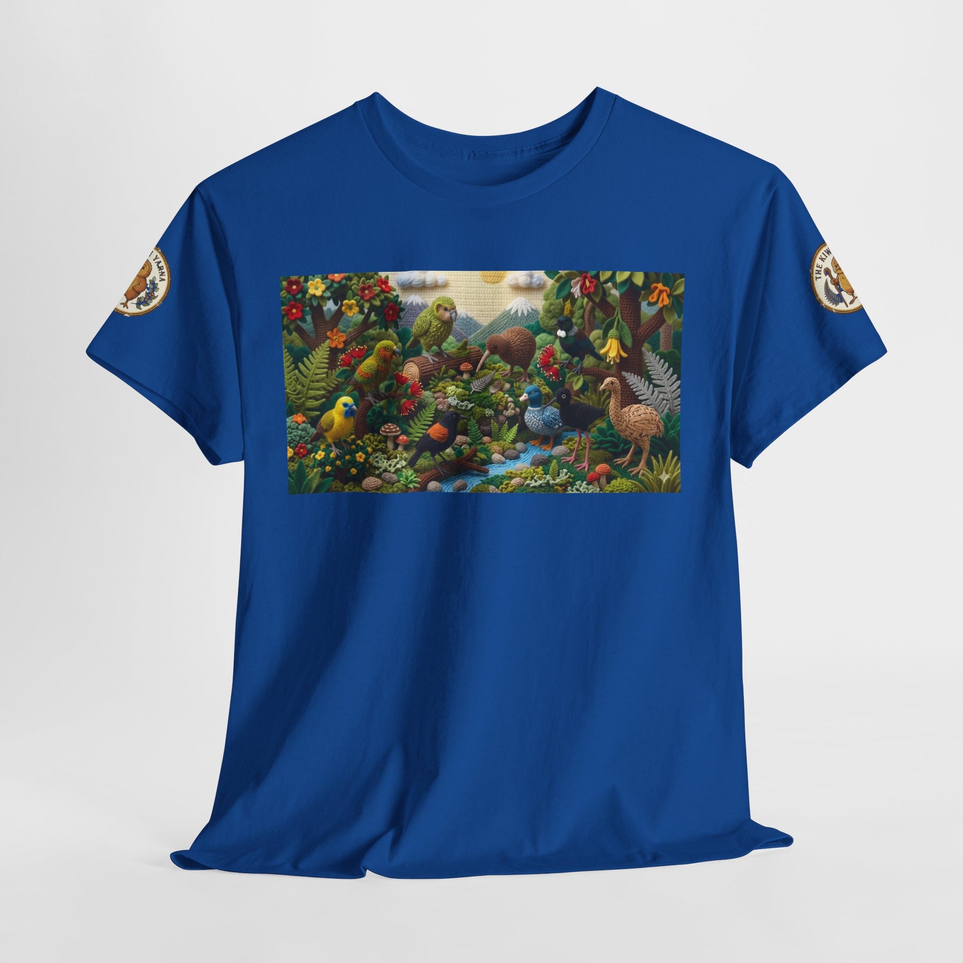 Blue graphic T-shirt with rectangular bird scene panel and sleeve logo patches