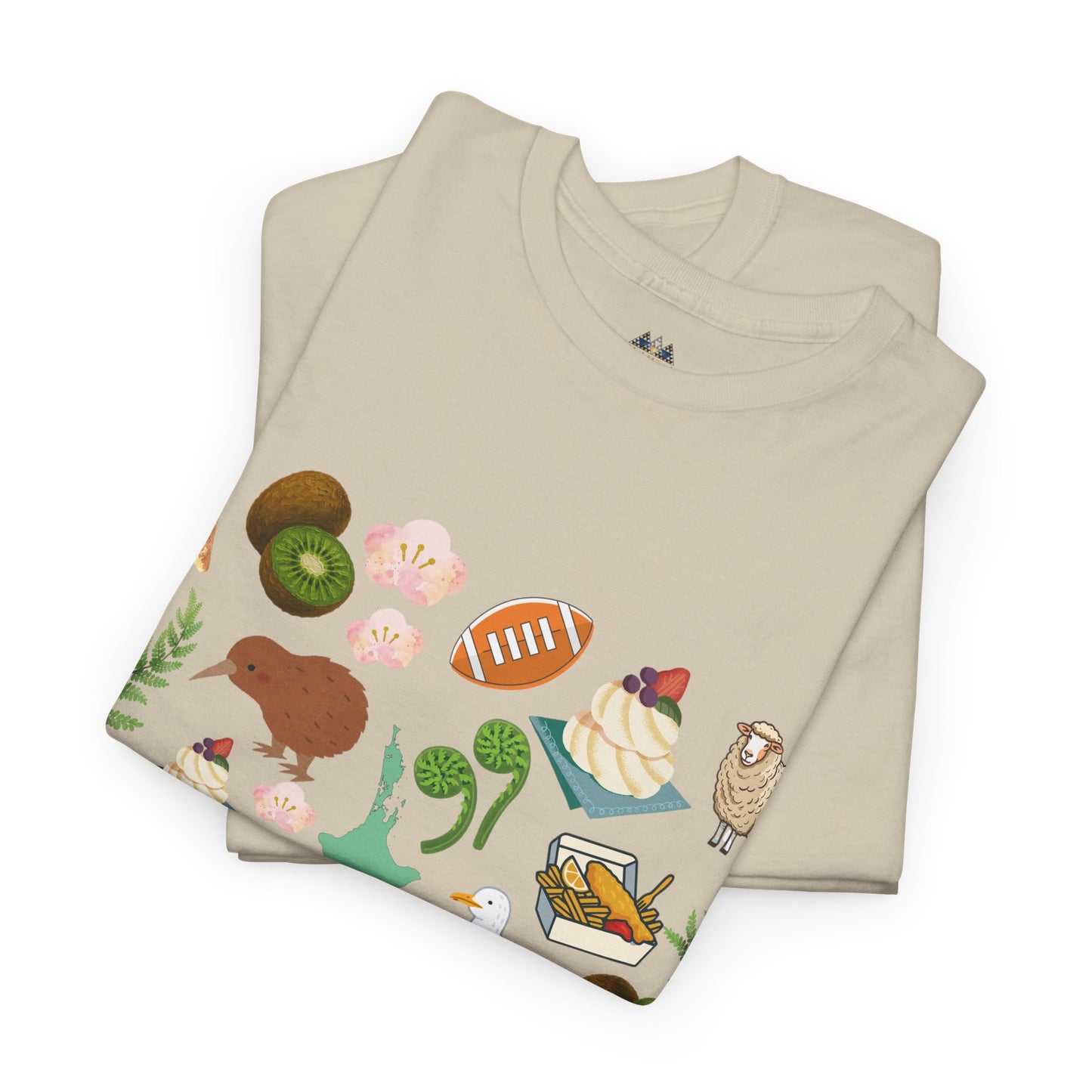 Beige crewneck T-shirt with colorful Kiwiana collage print folded