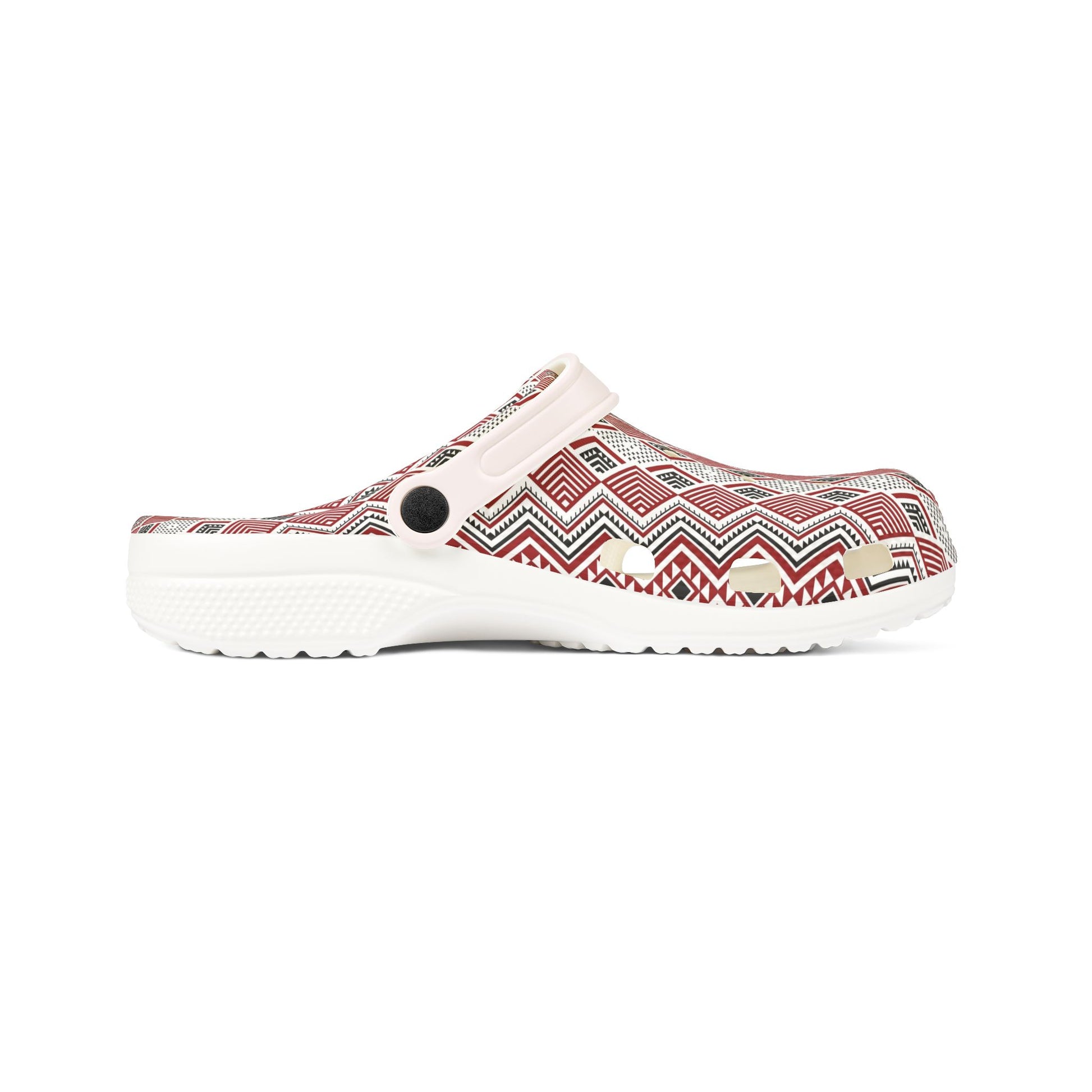 Tāniko slip-on clogs, side view, with red-and-white geometric print and black eyelet
