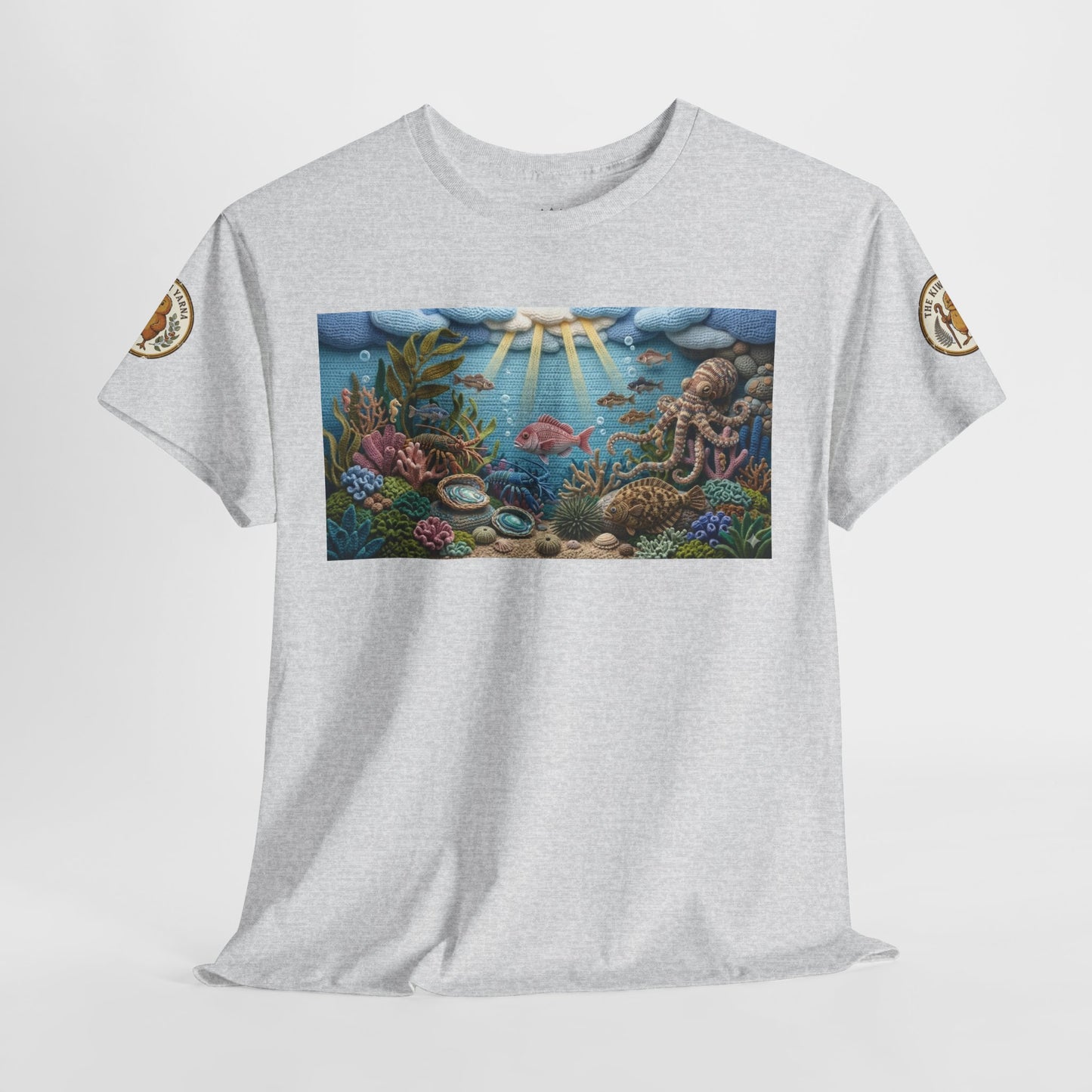 Light gray crewneck T-shirt with rectangular ocean graphic and circular sleeve logo patches