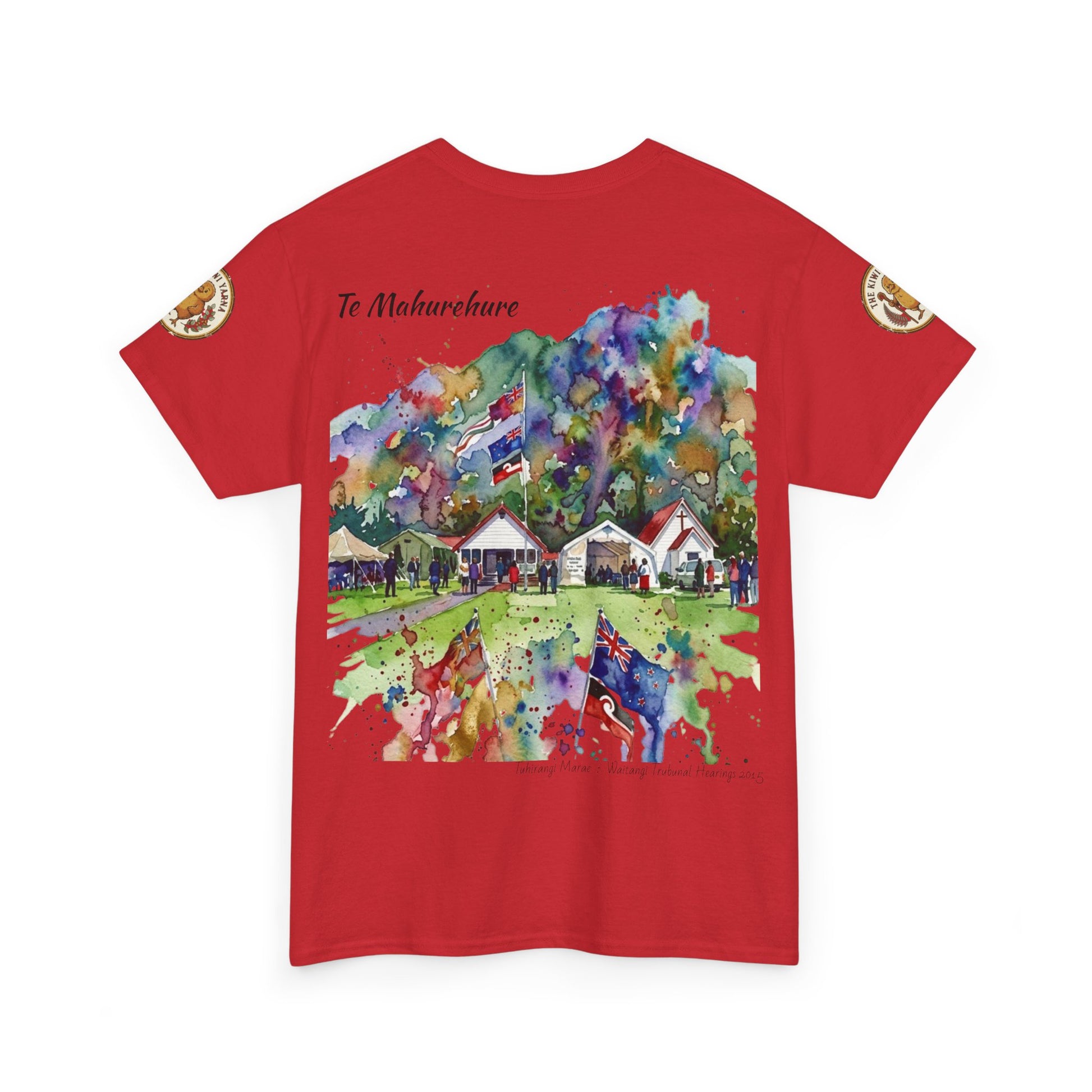 Red T-shirt with colorful village illustration graphic and short text at top
