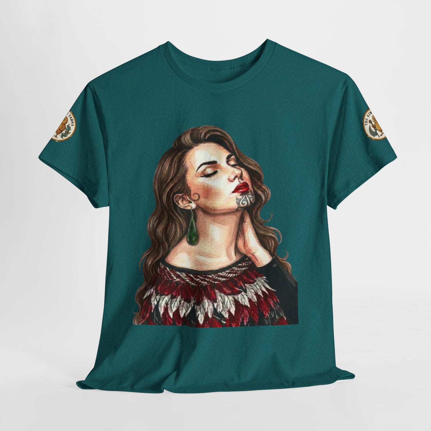 Teal graphic T-shirt with portrait face print and patch details on both sleeves