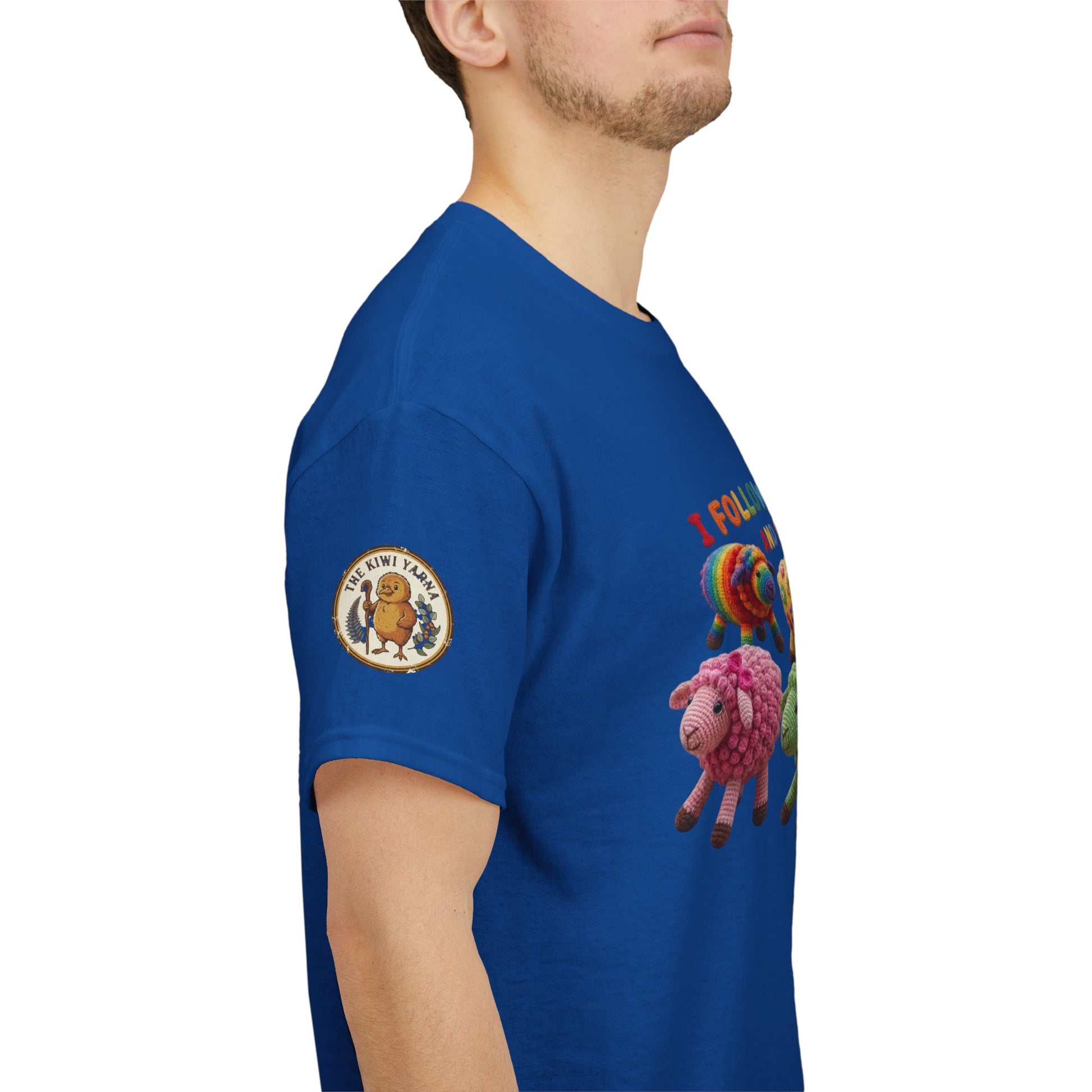 Royal blue T-shirt with sleeve emblem and colorful sheep graphic detail