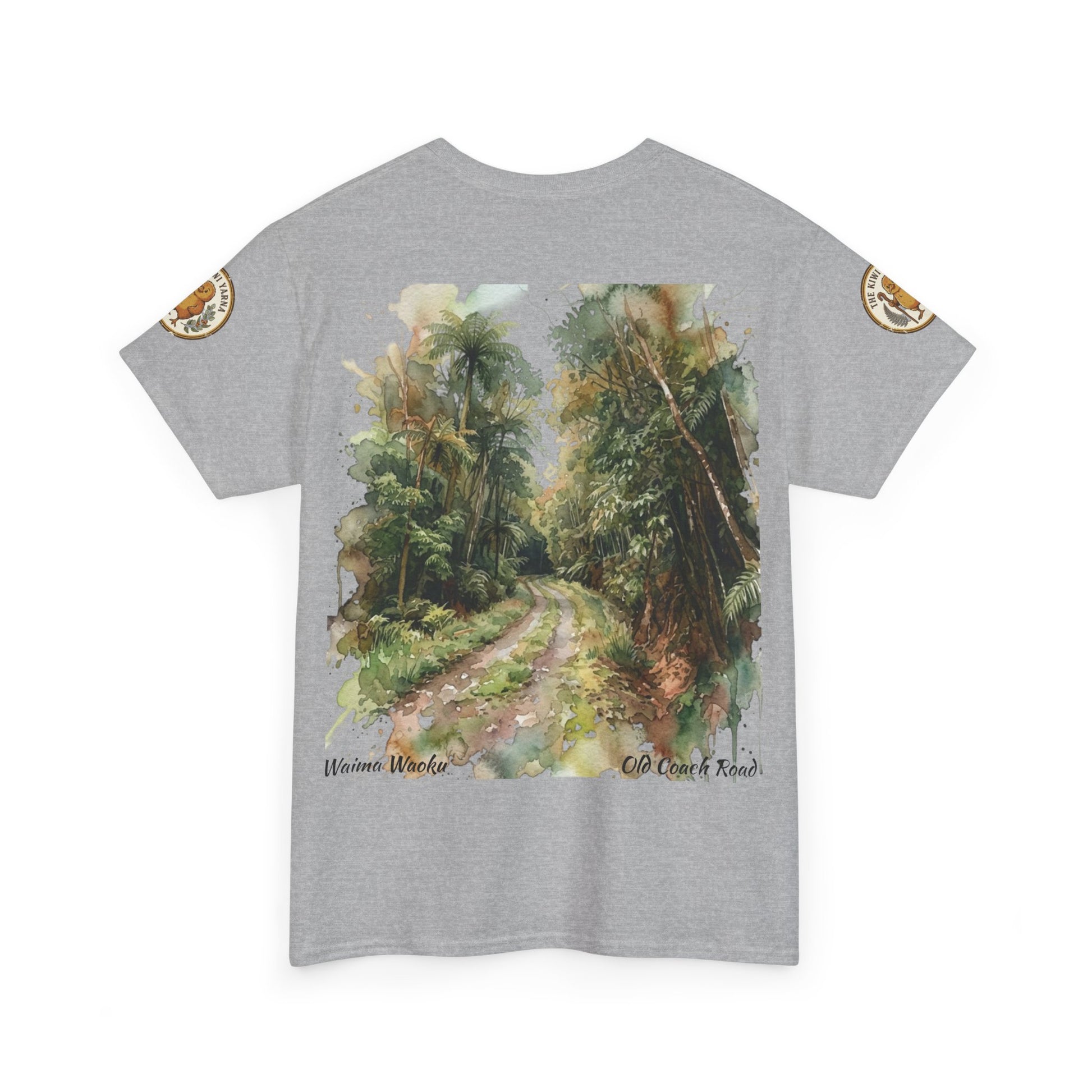 Grey T-shirt with large forest road graphic and small circular logo patches on sleeves