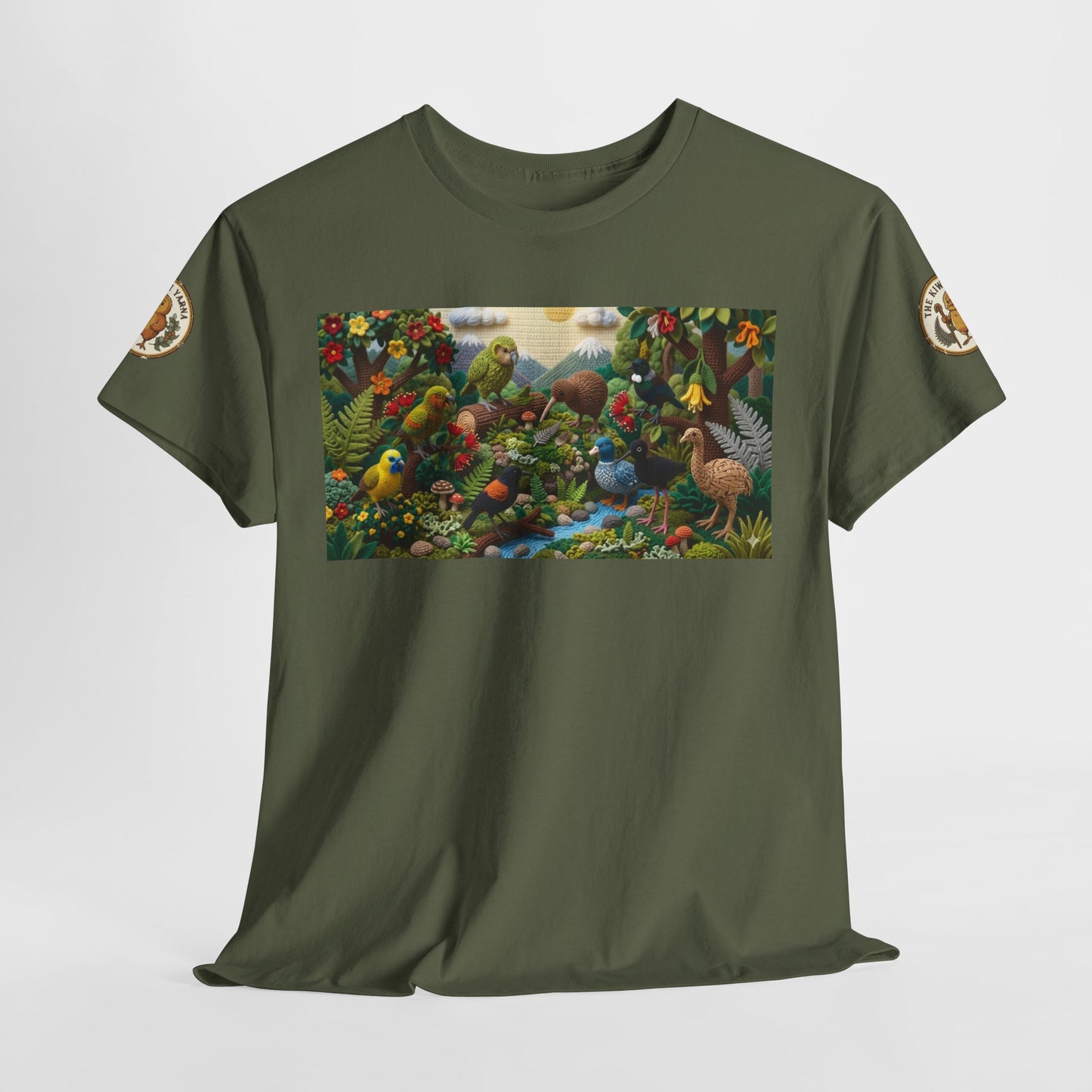 Olive green crewneck T-shirt with colorful bird-and-forest rectangular front graphic and sleeve patches