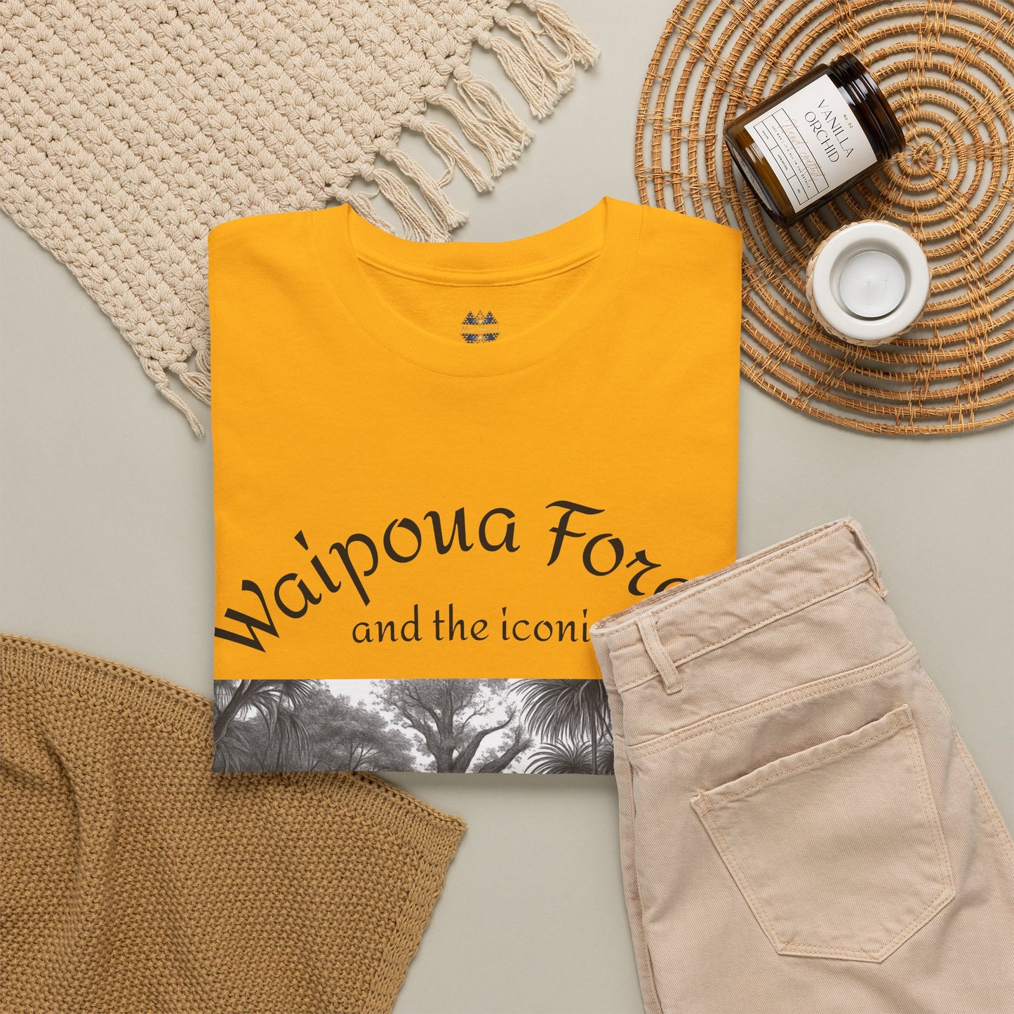 Yellow T-shirt with Waipoua lettering and forest photo panel