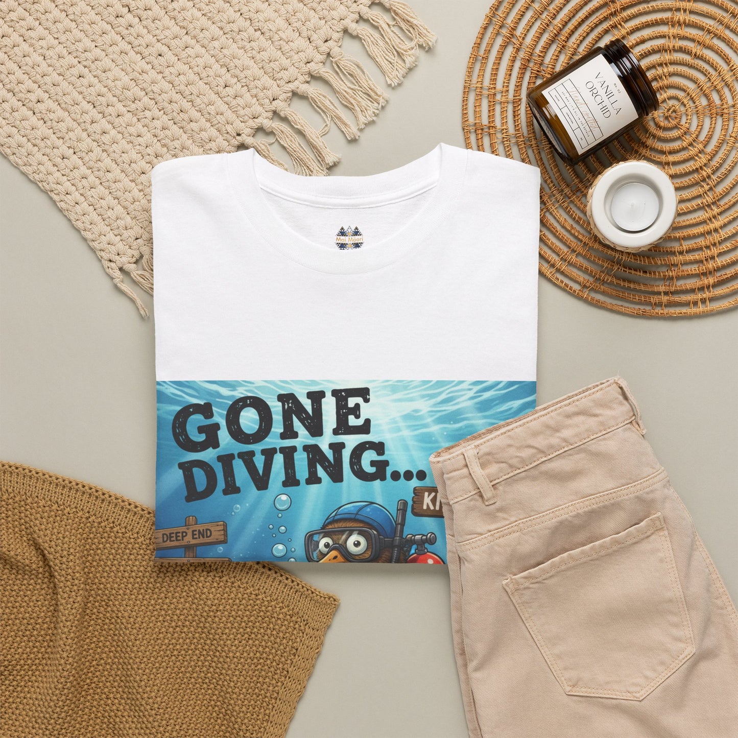 White crew-neck T-shirt with 'Gone Diving...' underwater scene graphic and small emblem
