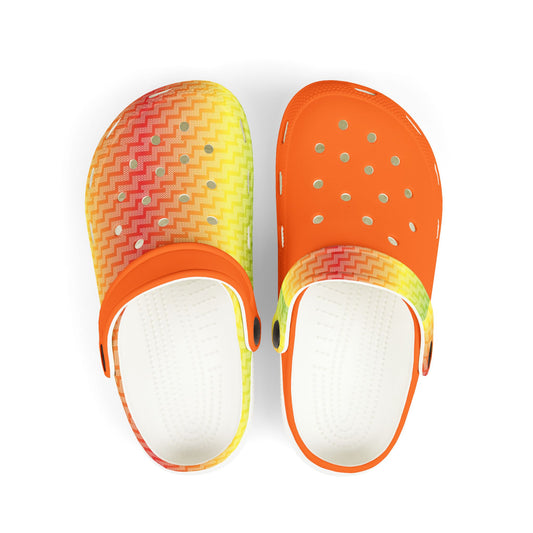 Pair of croc-style clogs with multicolor zigzag uppers and orange perforated tops