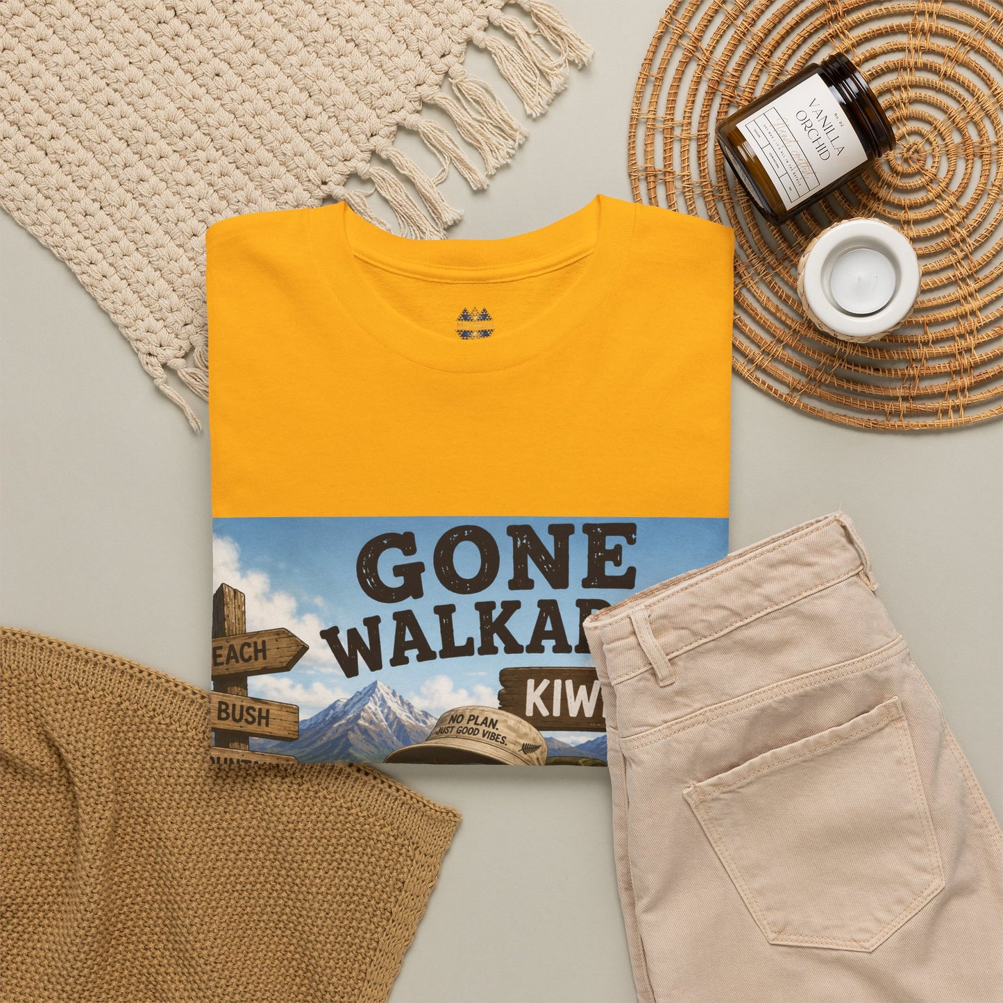 Yellow T-shirt with 'Gone Walkabout Kiwi Style' front graphic and crew neckline