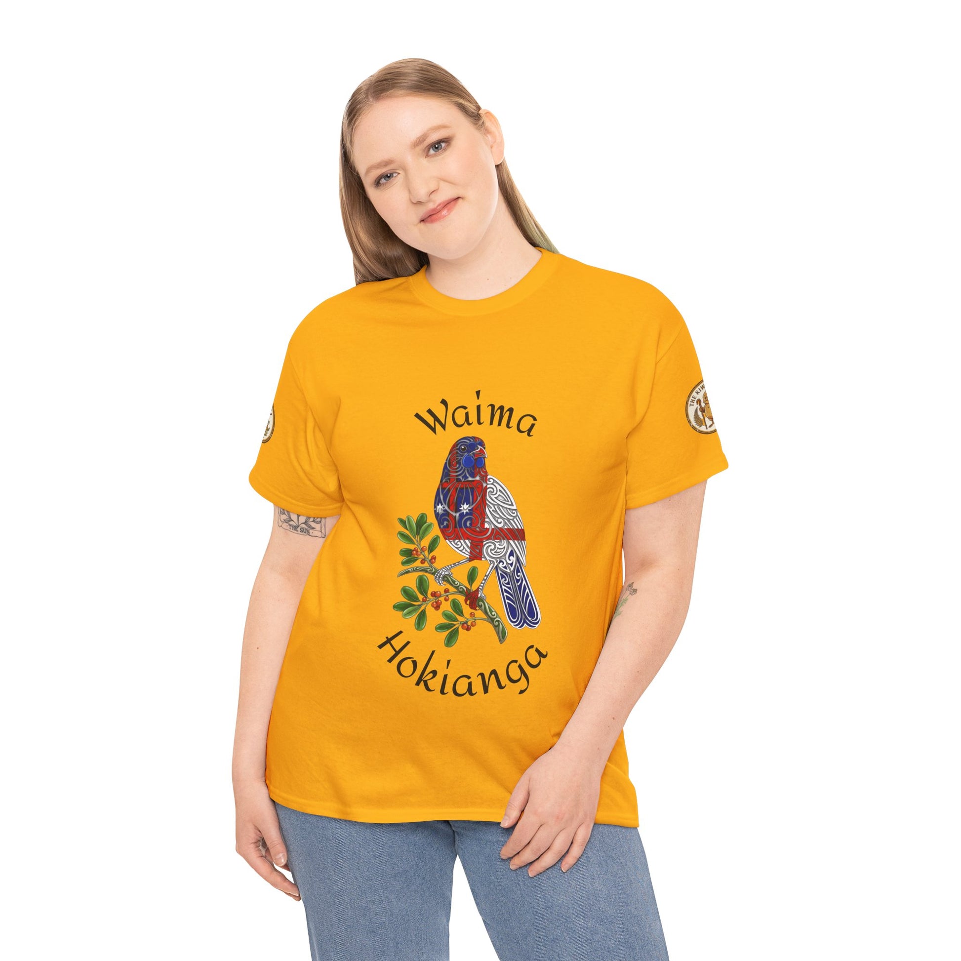 Tuhirangi Marae gold graphic T-shirt with bird and floral print