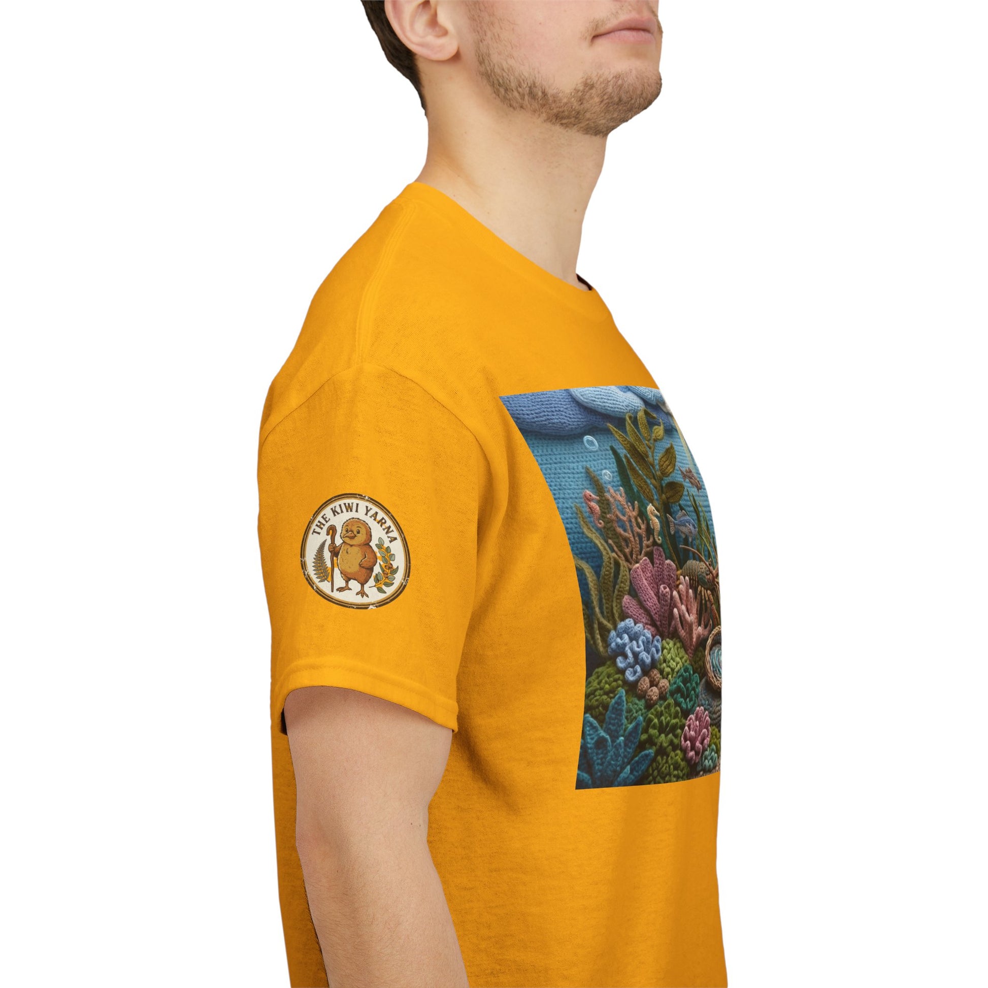 Mustard yellow T-shirt with circular logo patch on sleeve and ocean print panel