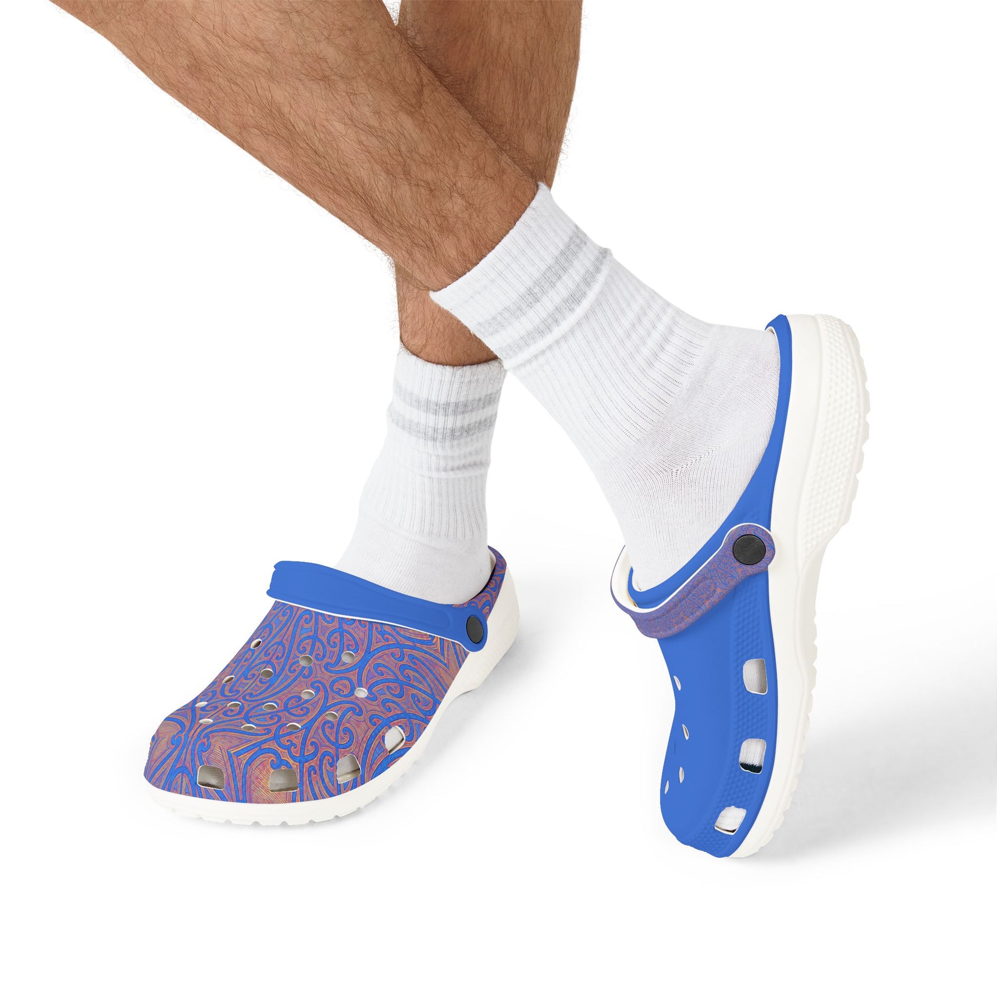 Māpouriki slip-on clogs worn with white socks; patterned left and solid blue right