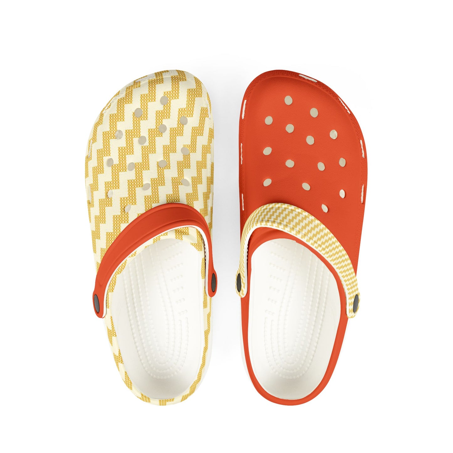Poutama patterned clogs with orange tops, zigzag uppers, and white footbeds