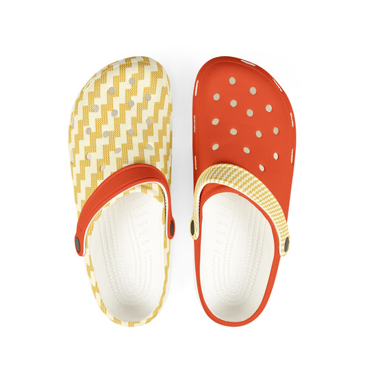 Poutama patterned clogs with orange tops, zigzag uppers, and white footbeds
