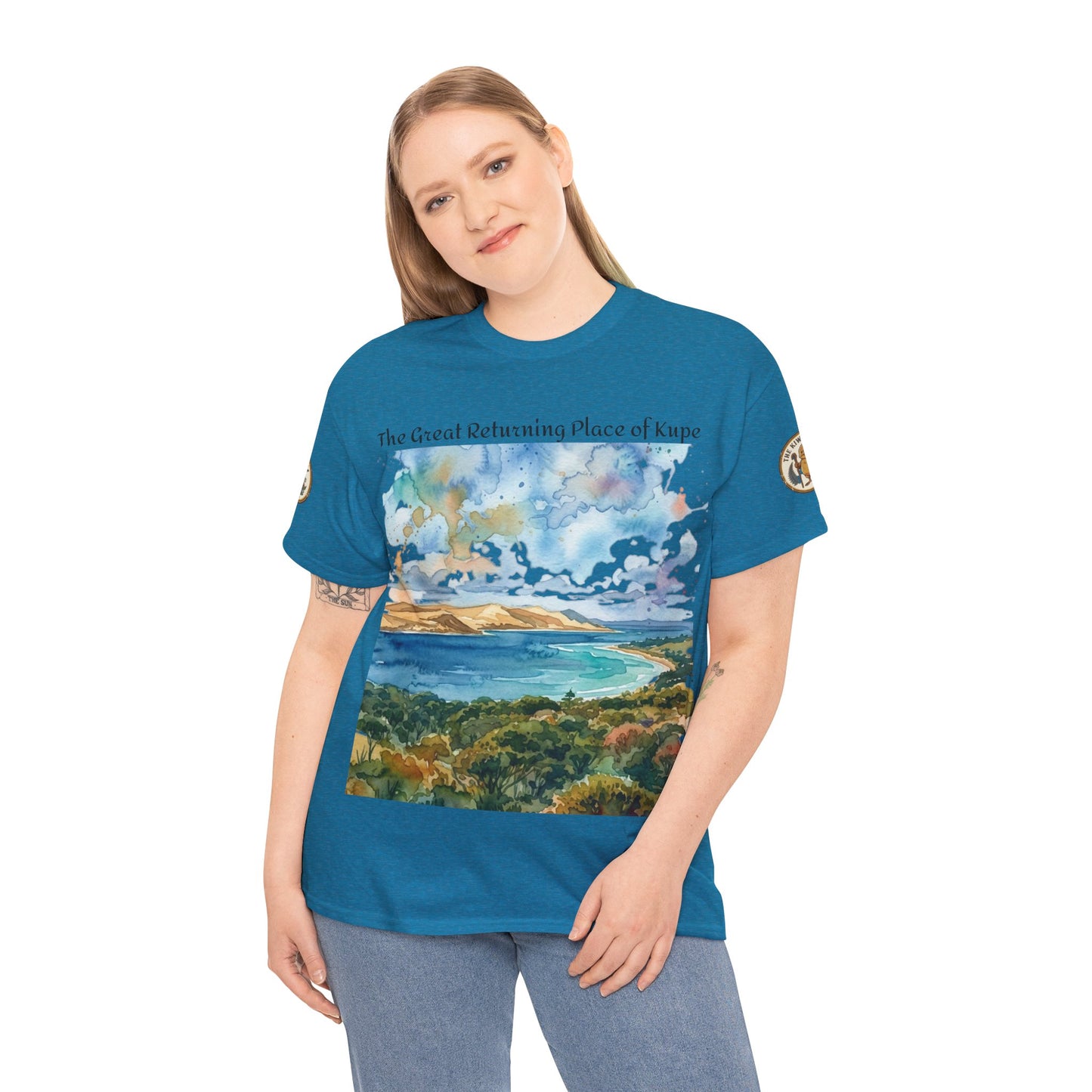 Teal unisex graphic T-shirt on model, front landscape print and sleeve emblem