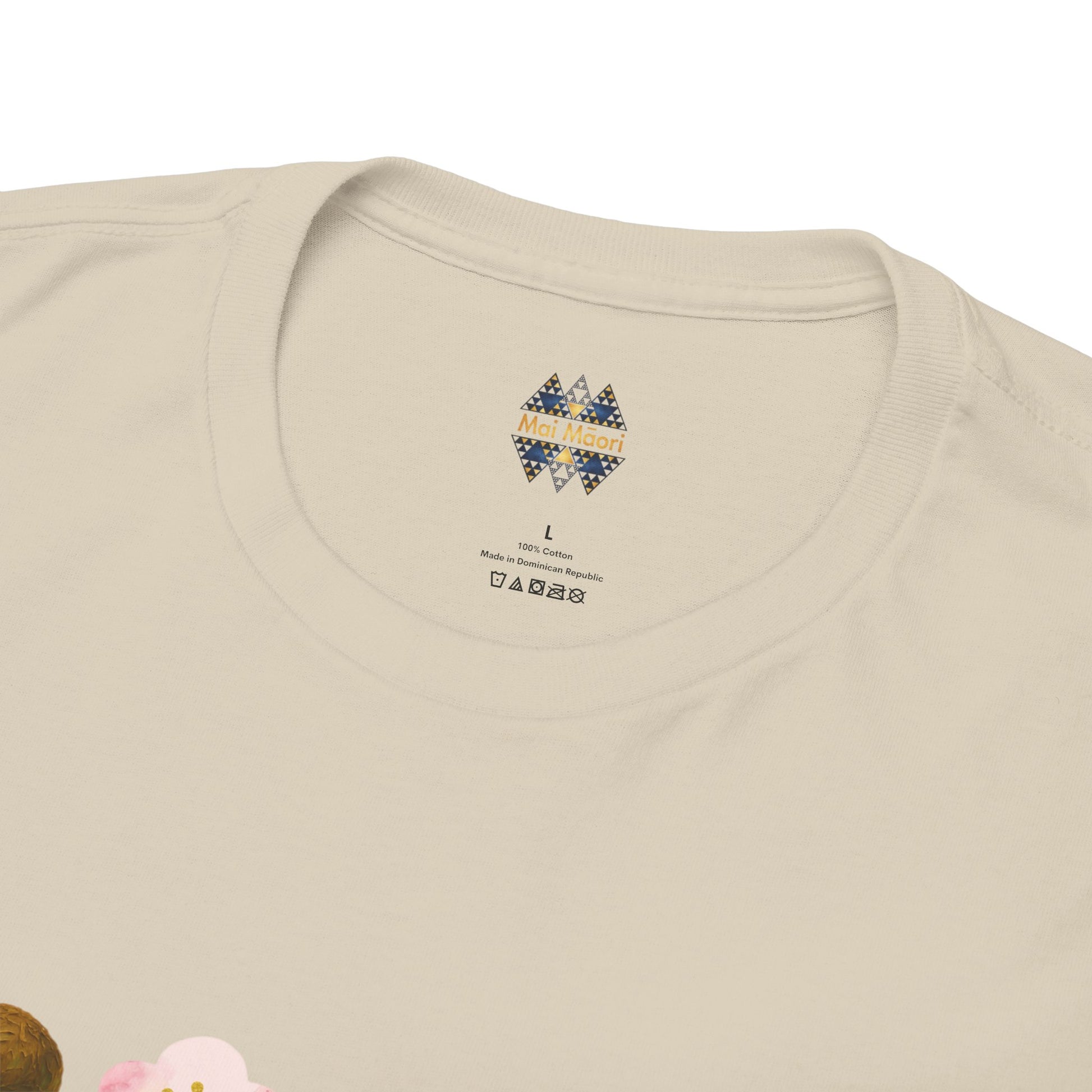 Beige crewneck T-shirt close-up of small chest graphic logo