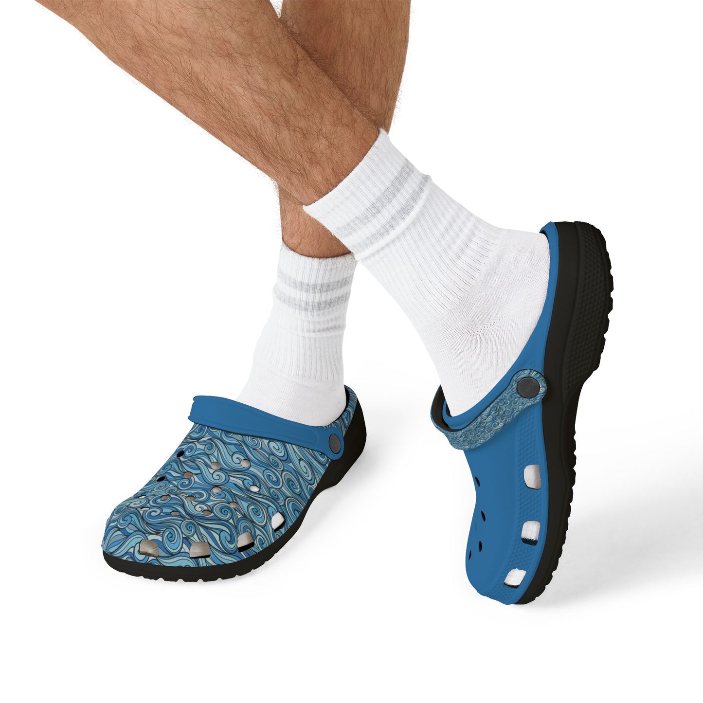 Blue and patterned slip-on clog sandals worn with white crew socks