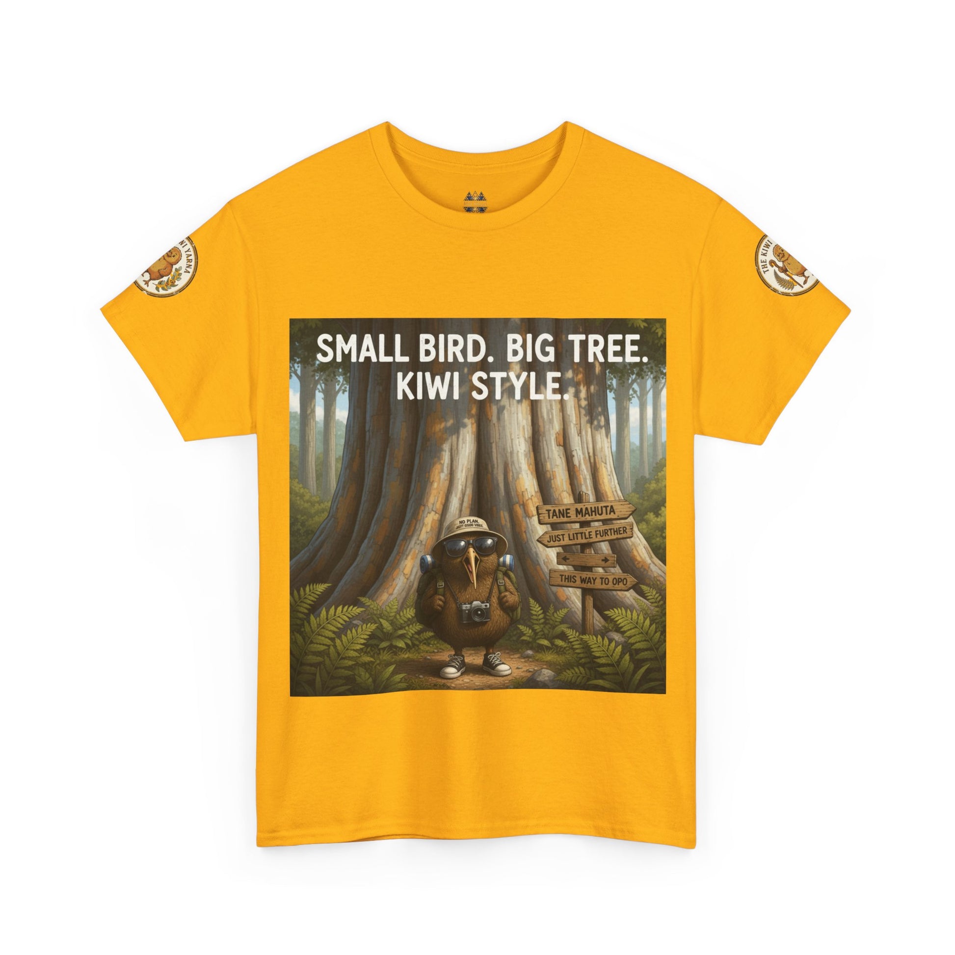 Mustard yellow crewneck T-shirt with front graphic of kiwi in forest and logo sleeve patches