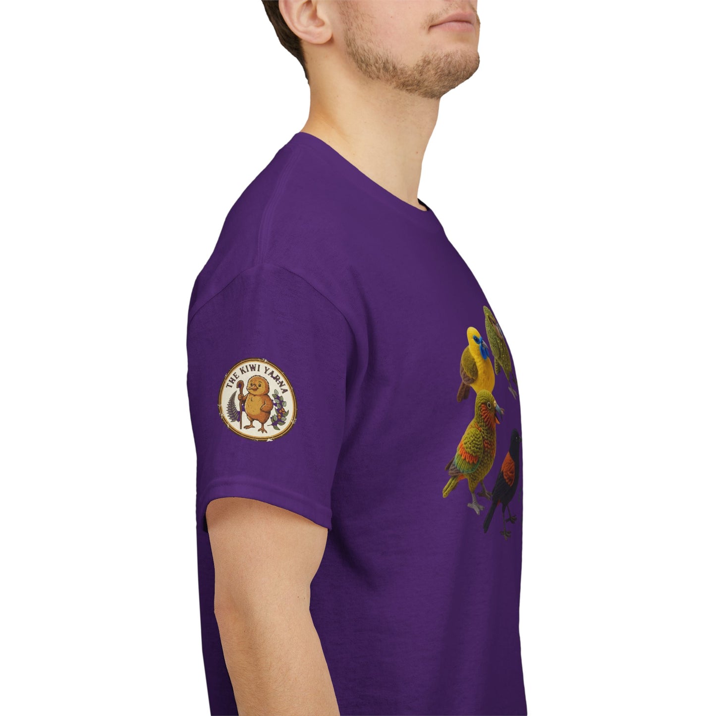 Purple graphic T-shirt with birds and circular sleeve emblem
